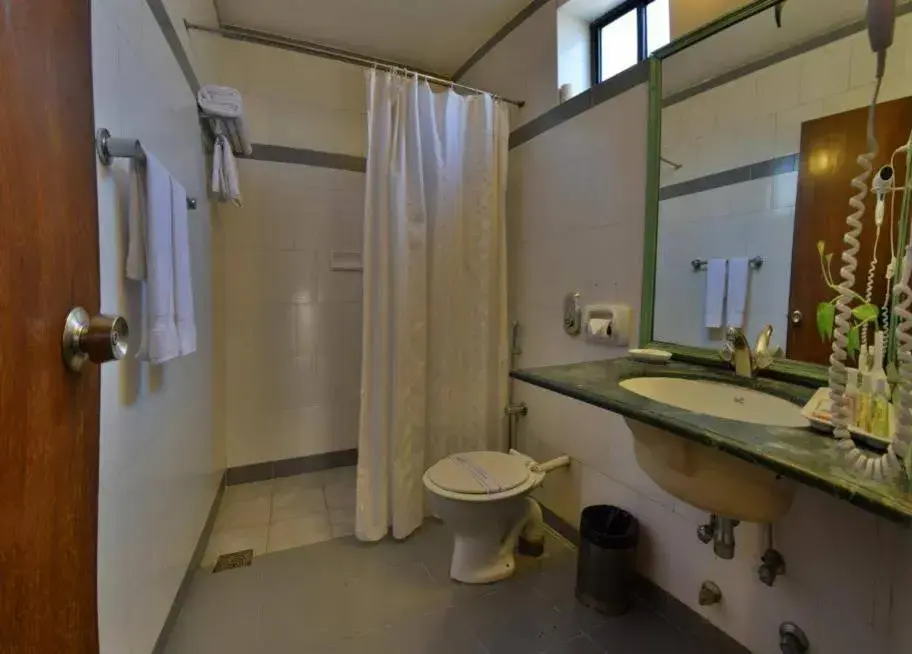 Bathroom in Pride Sun Village Resort & Spa Bathroom in Pride Sun Village Resort & Spa