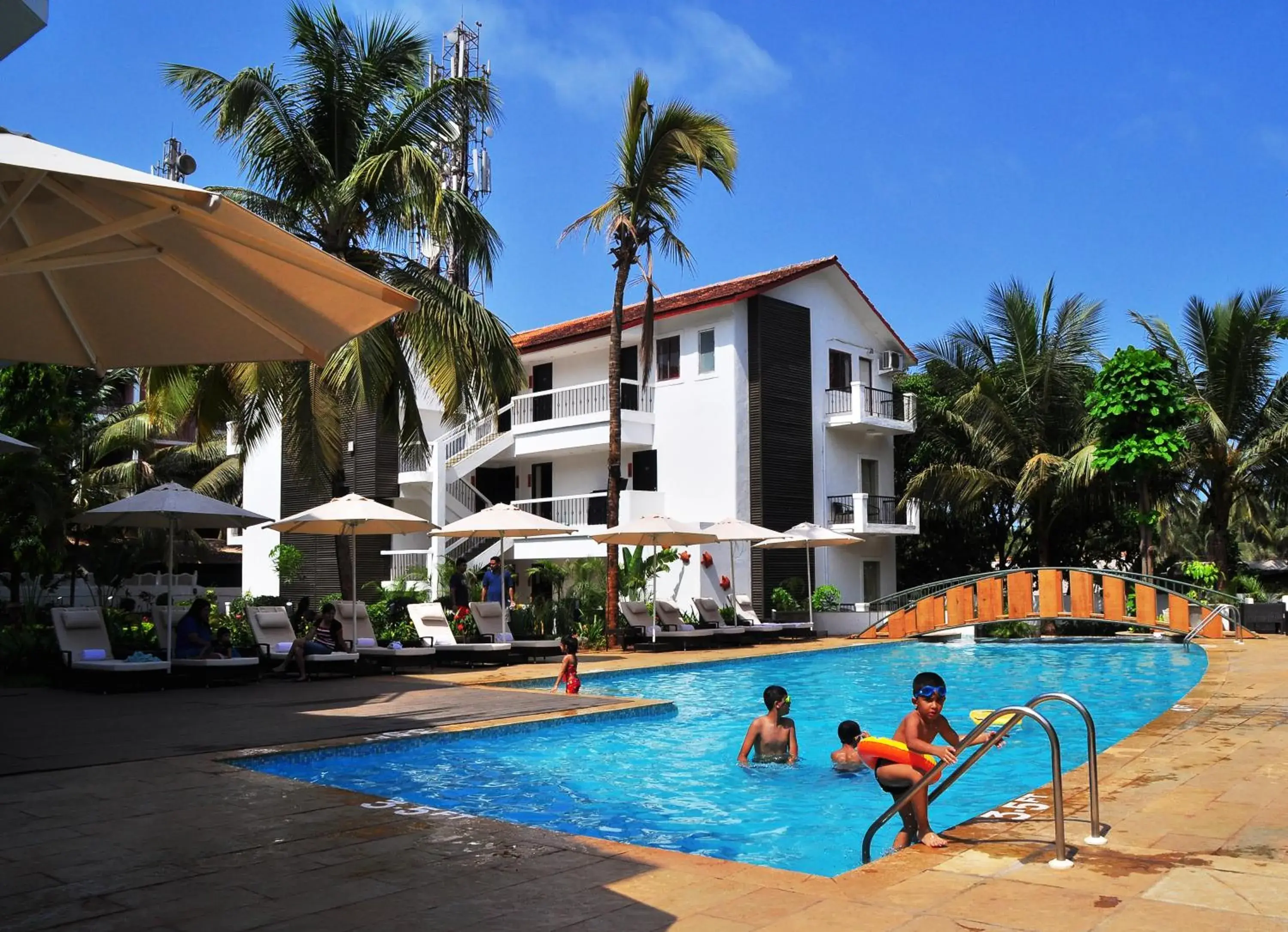 Swimming pool in Kyriad Prestige Calangute Goa by OTHPL Swimming pool in Kyriad Prestige Calangute Goa by OTHPL