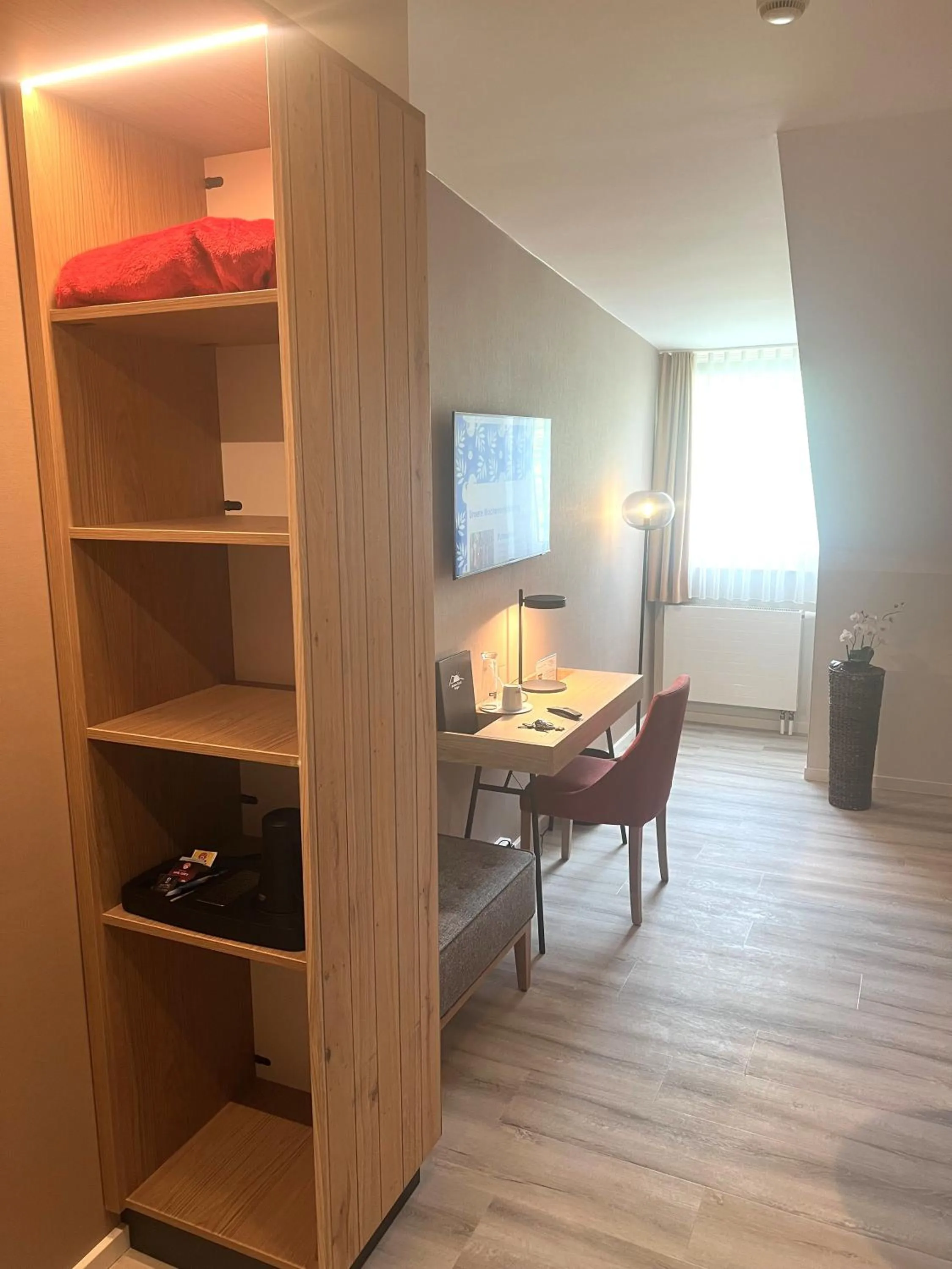 Photo of the whole room, Bed in Atrium Hotel Krüger