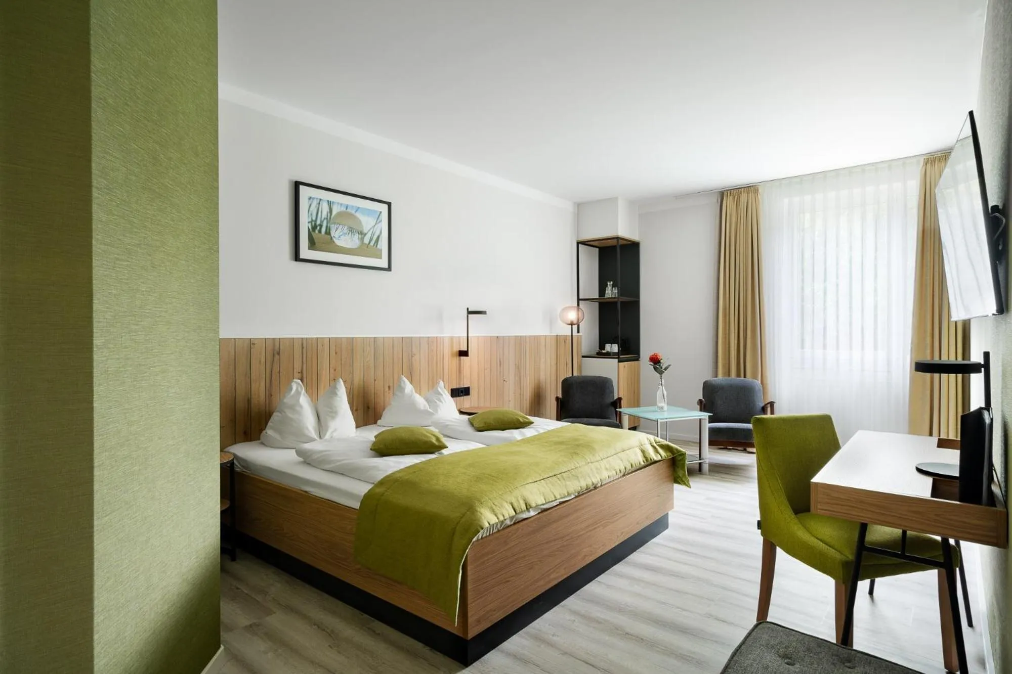 Bed in Atrium Hotel Krüger