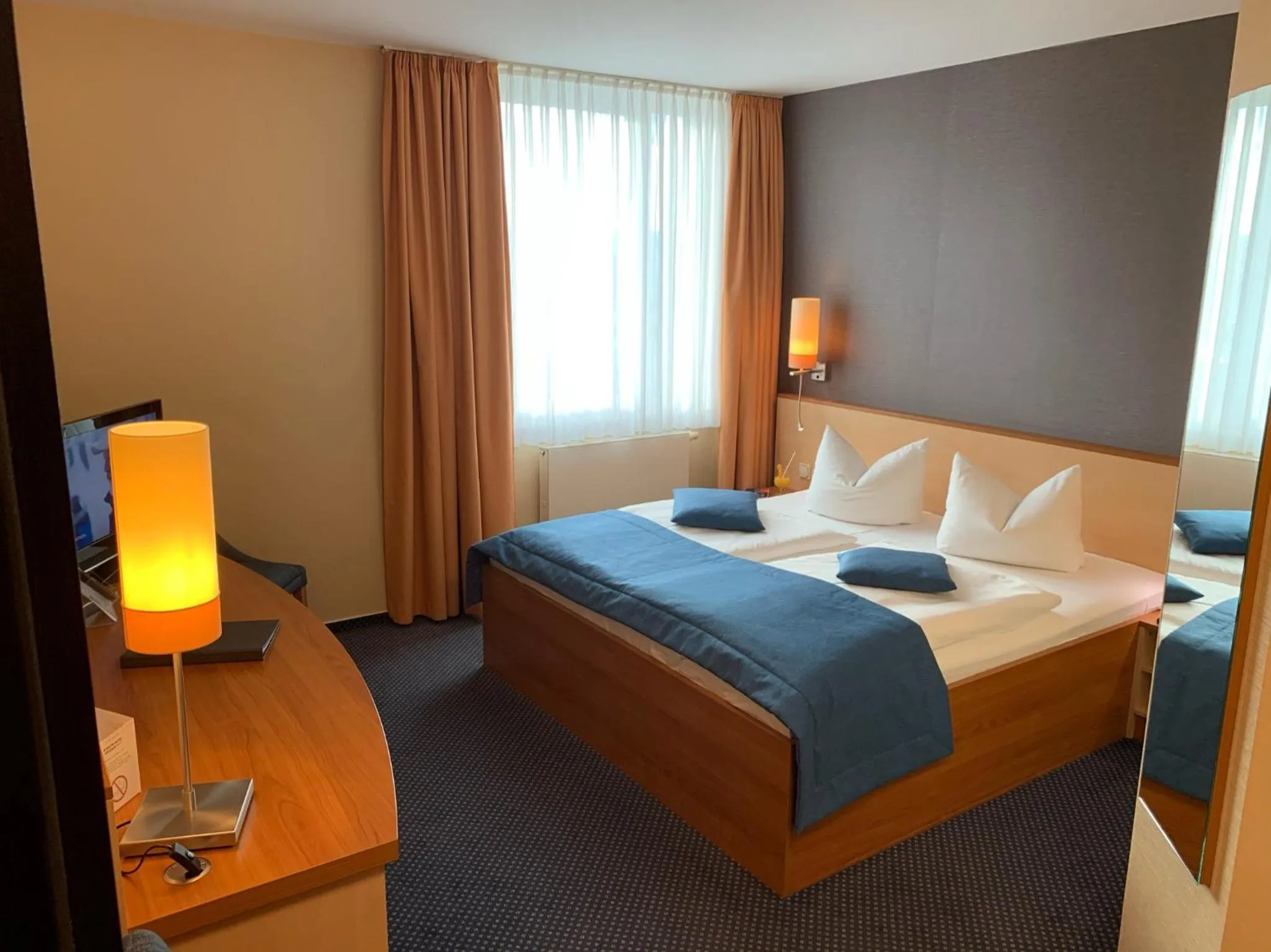 Photo of the whole room, Bed in Atrium Hotel Krüger