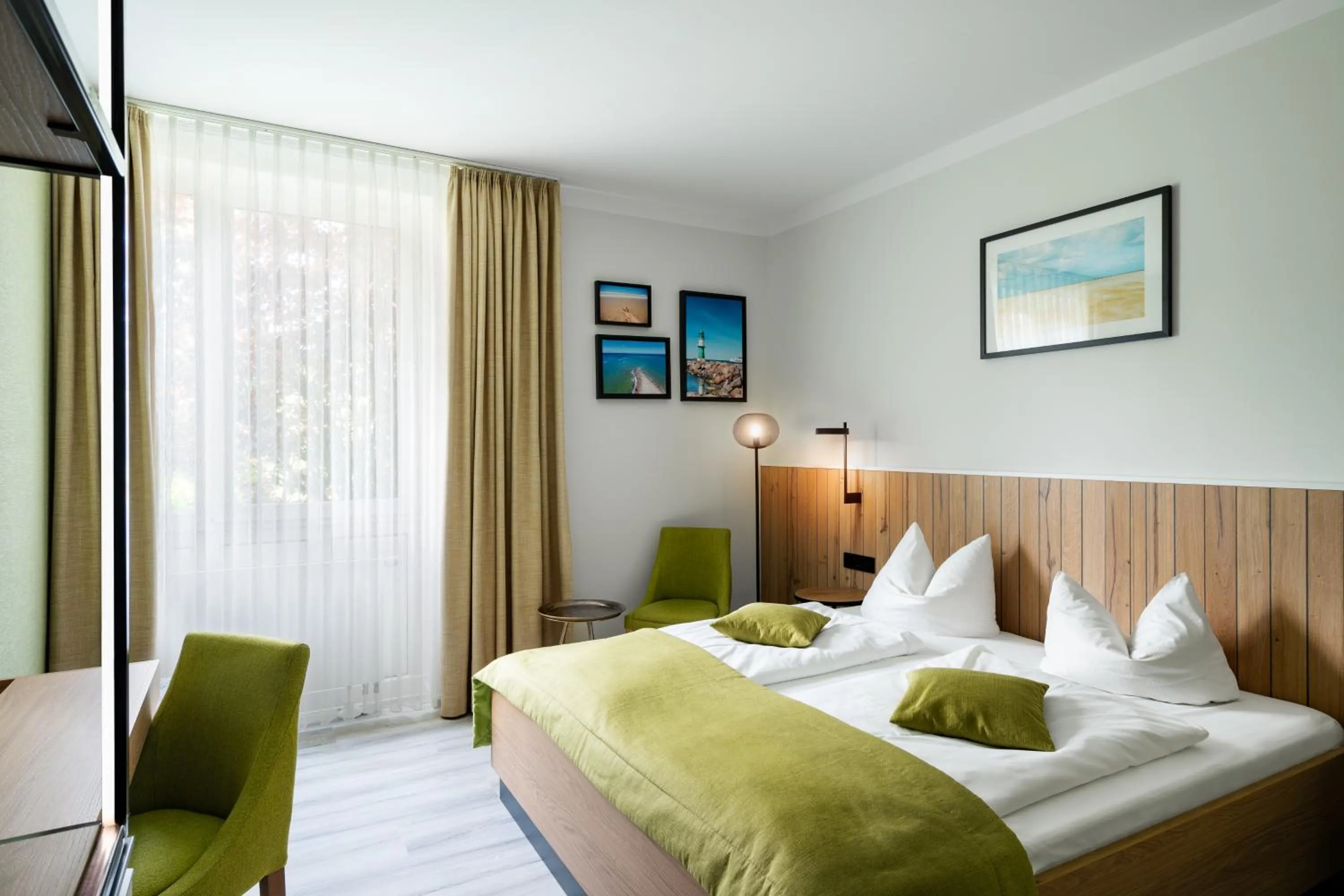 Bed in Atrium Hotel Krüger