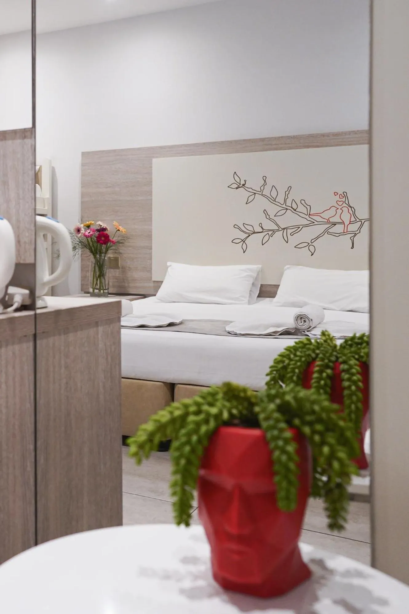 Bed in Nicholas Color Hotel