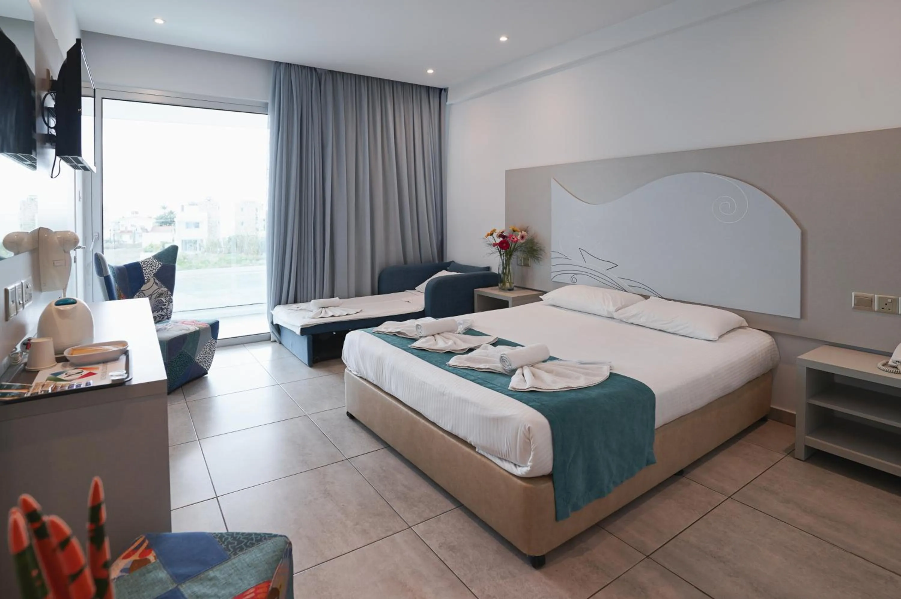 Bed in Nicholas Color Hotel