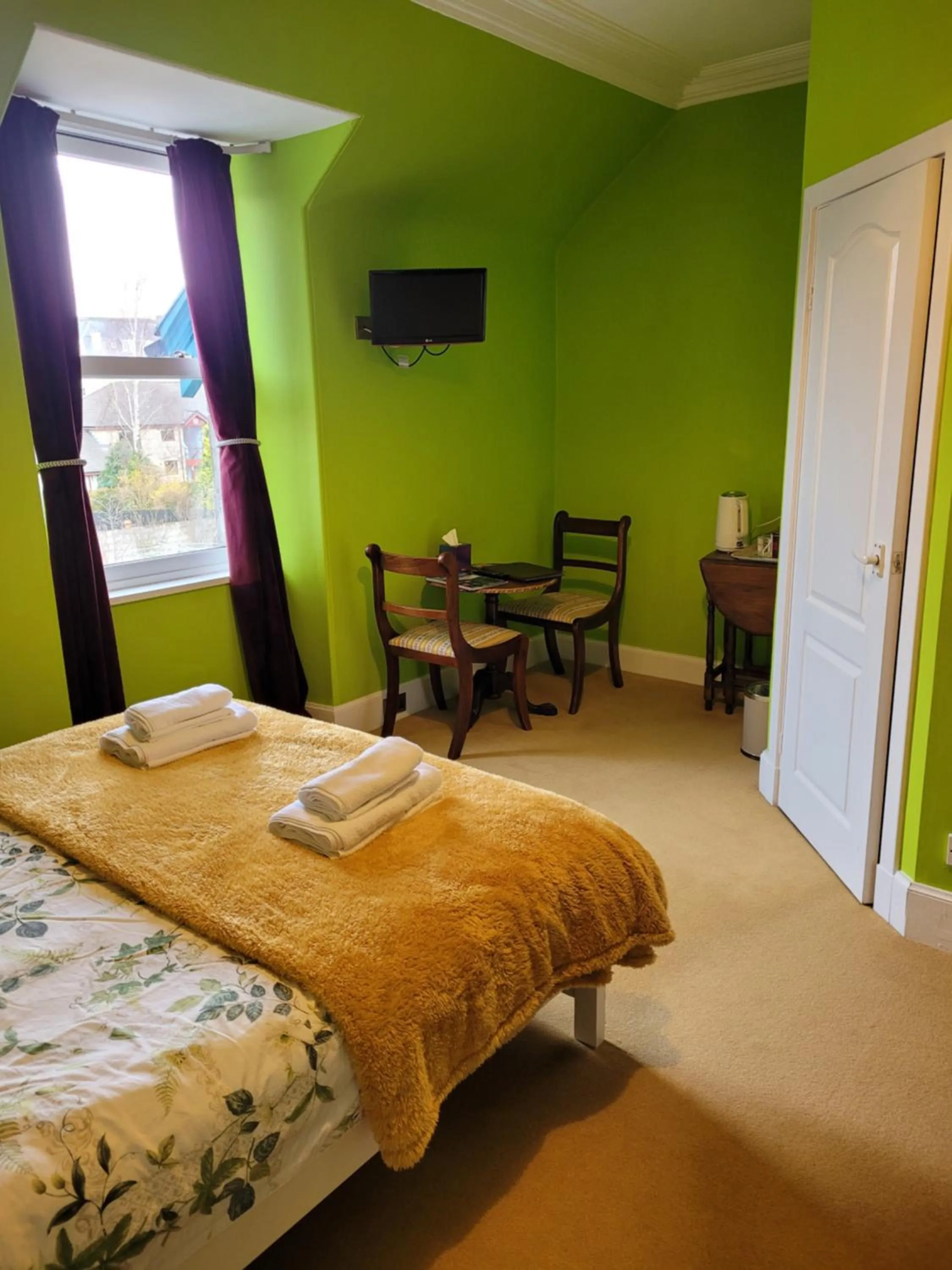 Bed in Dunallan Guest House