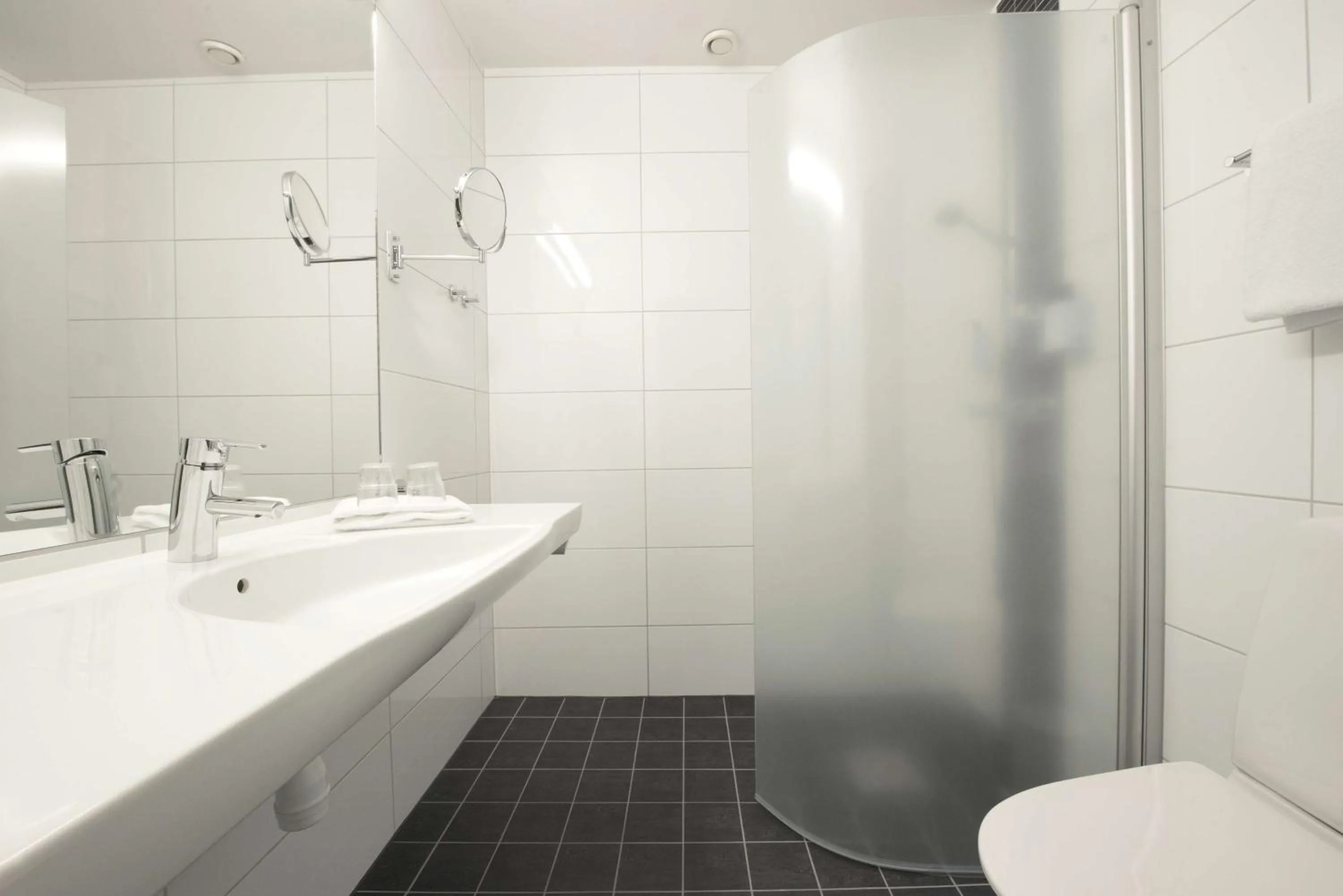 Bathroom in Scandic Elmia