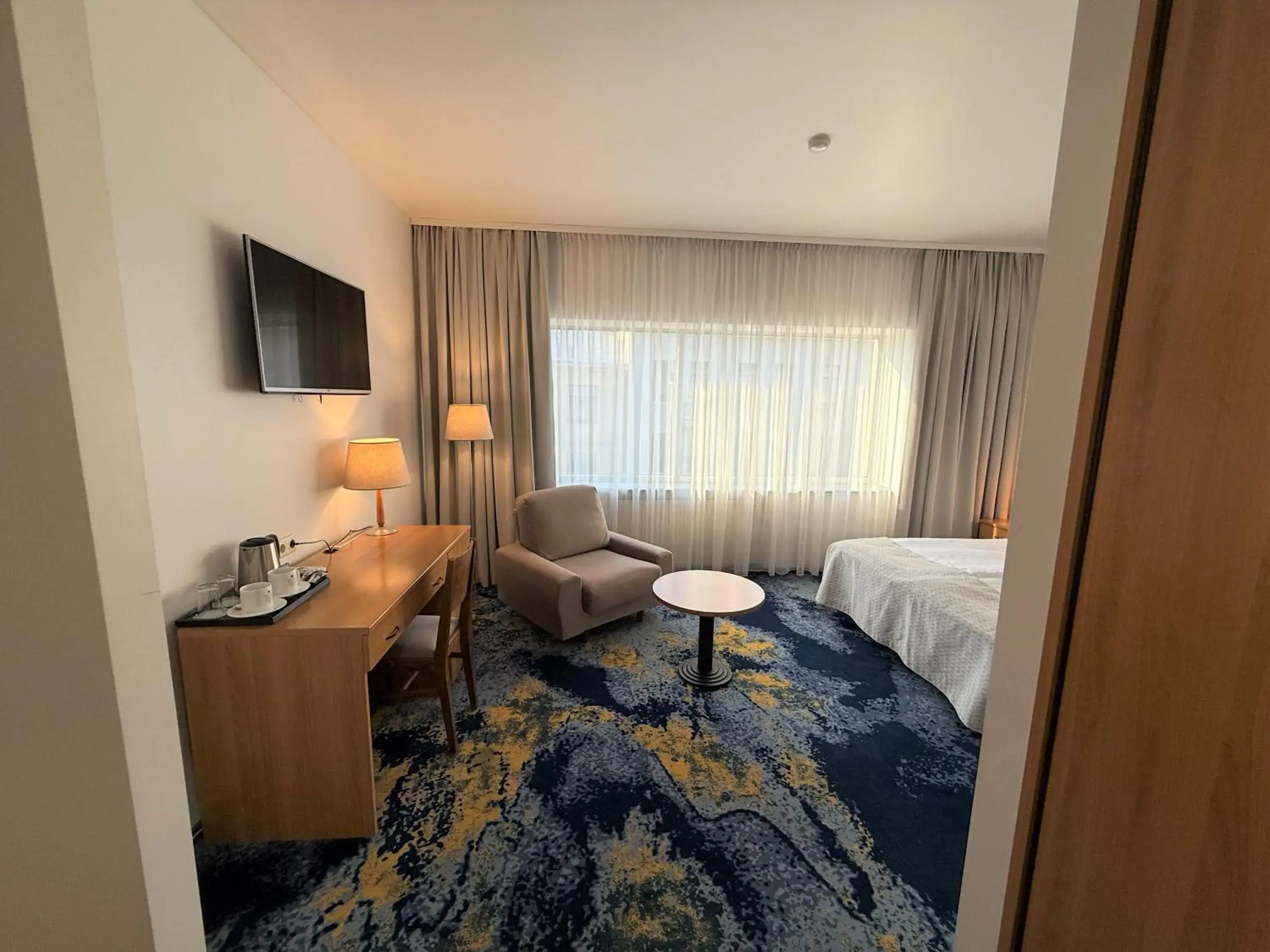 Coffee/tea facilities, Bed in BEST BALTIC Kaunas Coffee/tea facilities, Bed in BEST BALTIC Kaunas