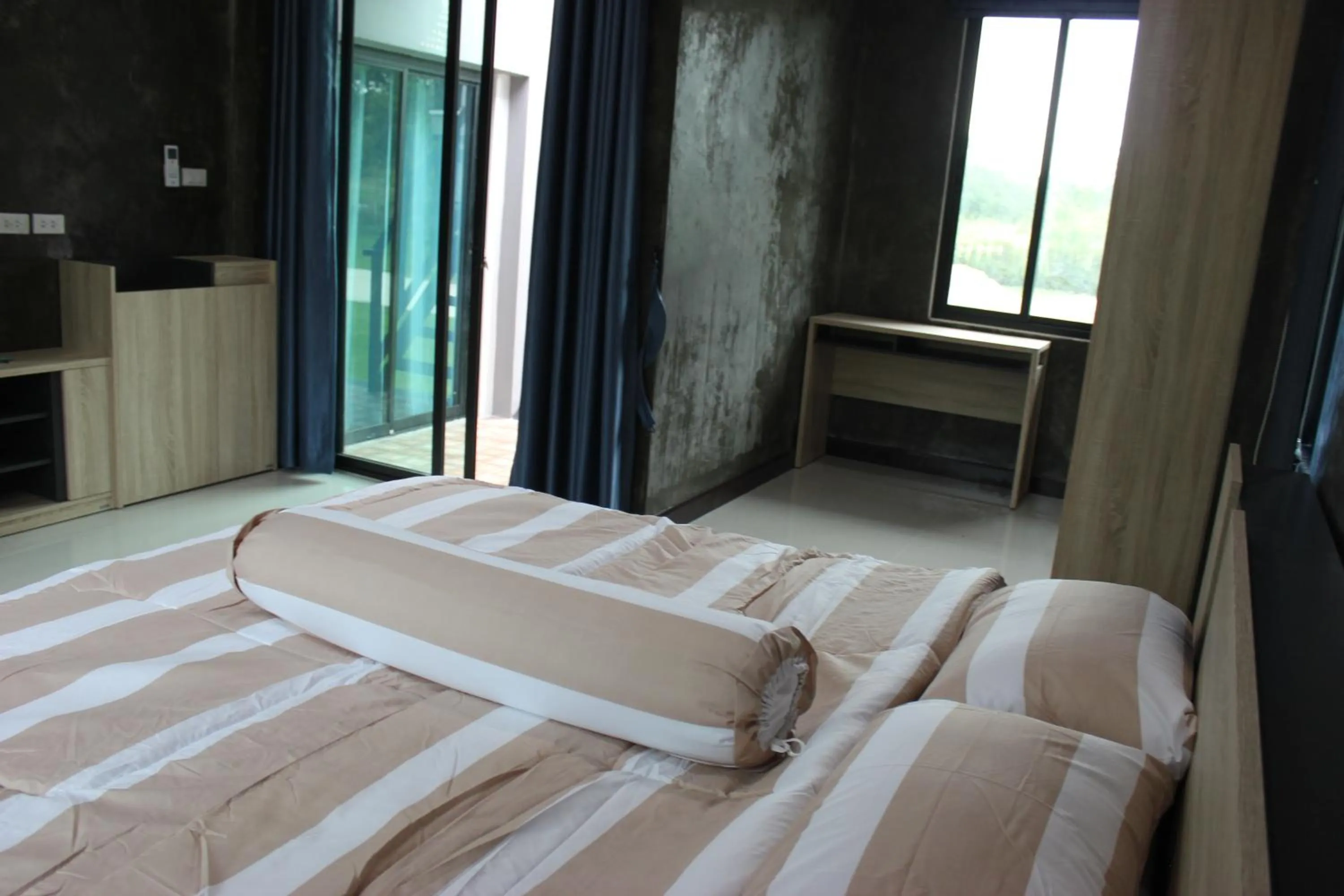 Bed in Baan Rabiengkao Hua Hin