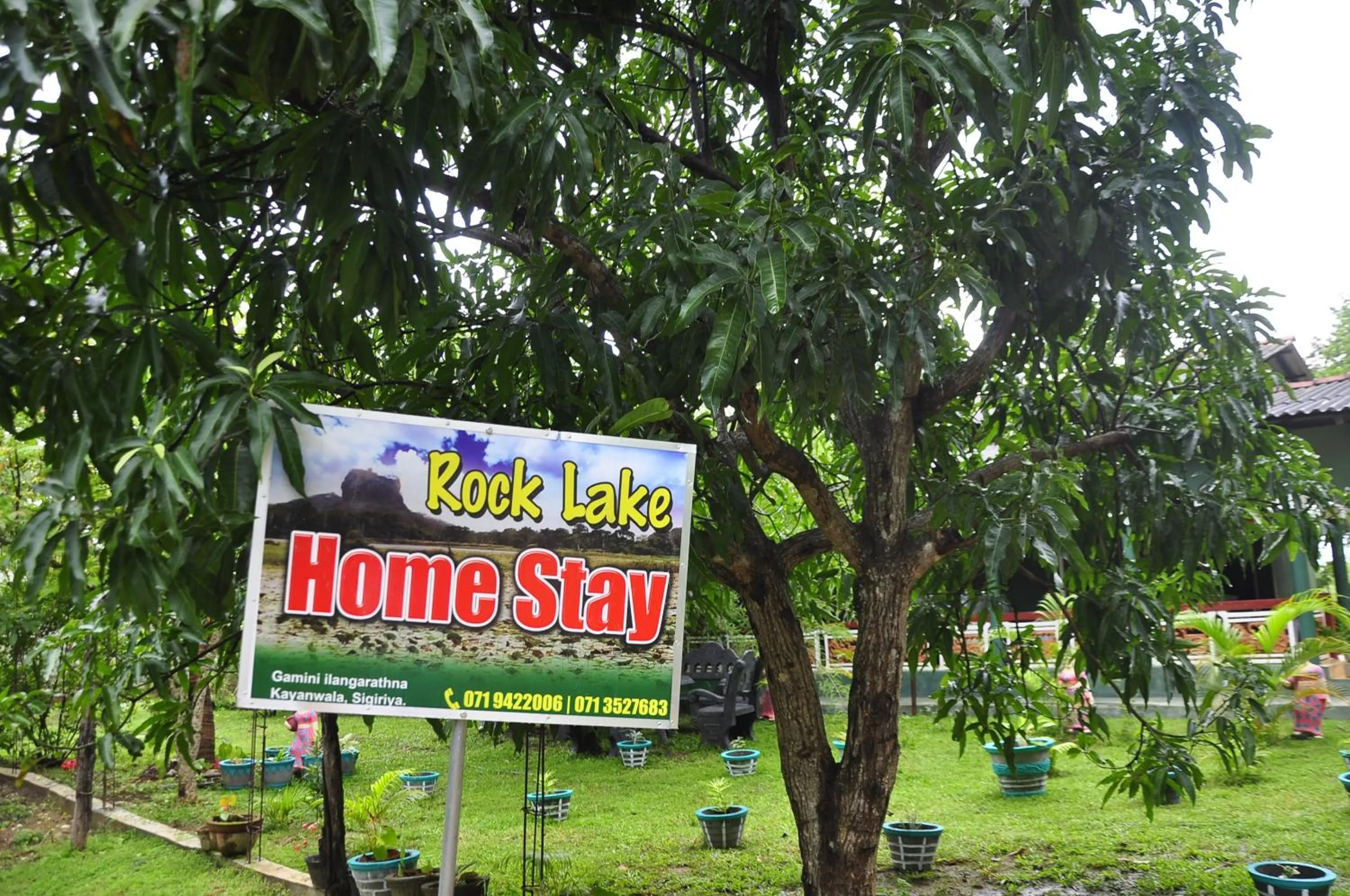 Property logo or sign in Rock Lake Home Stay