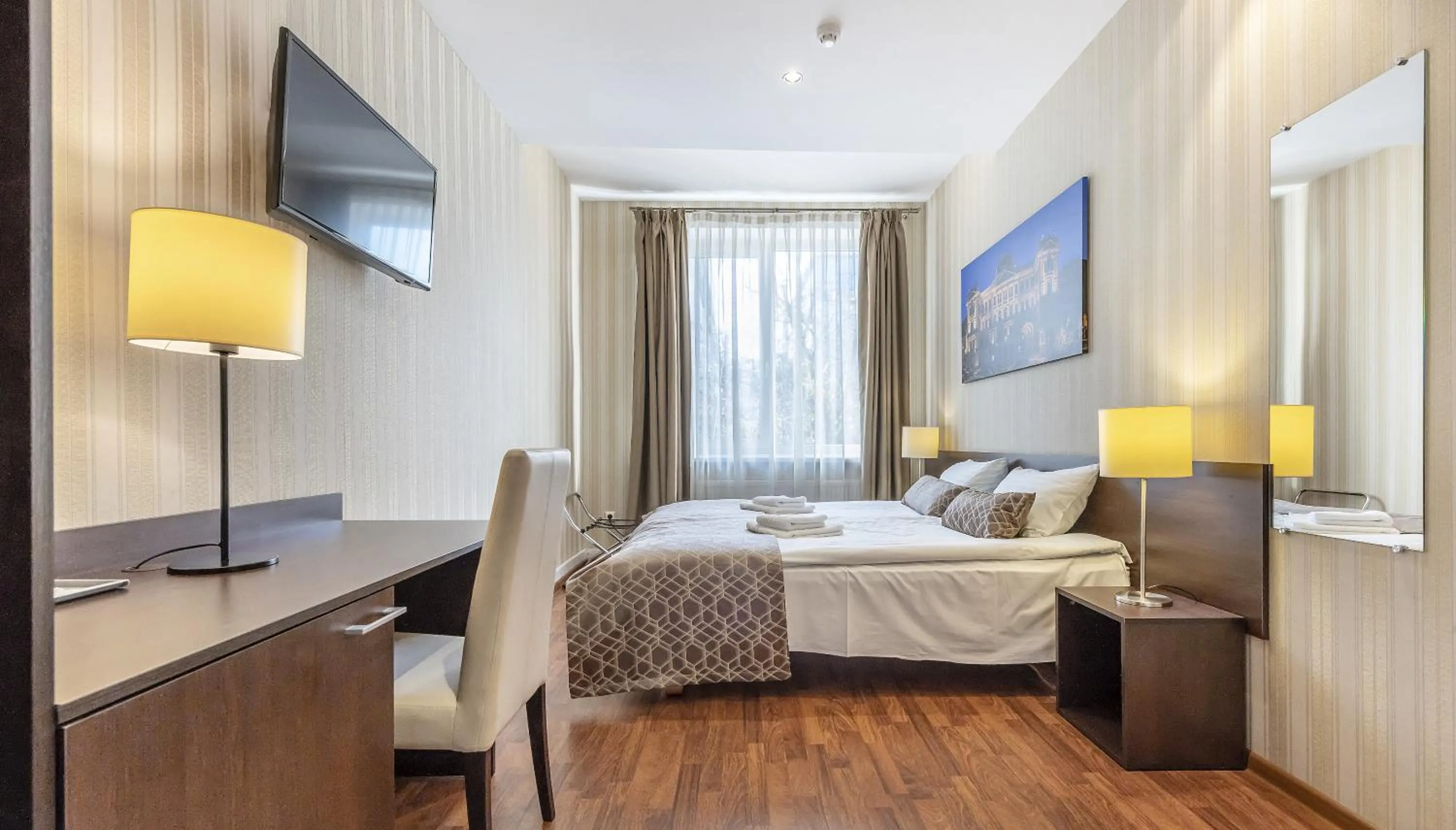 Living room, Bed in Vilnius City Hotel