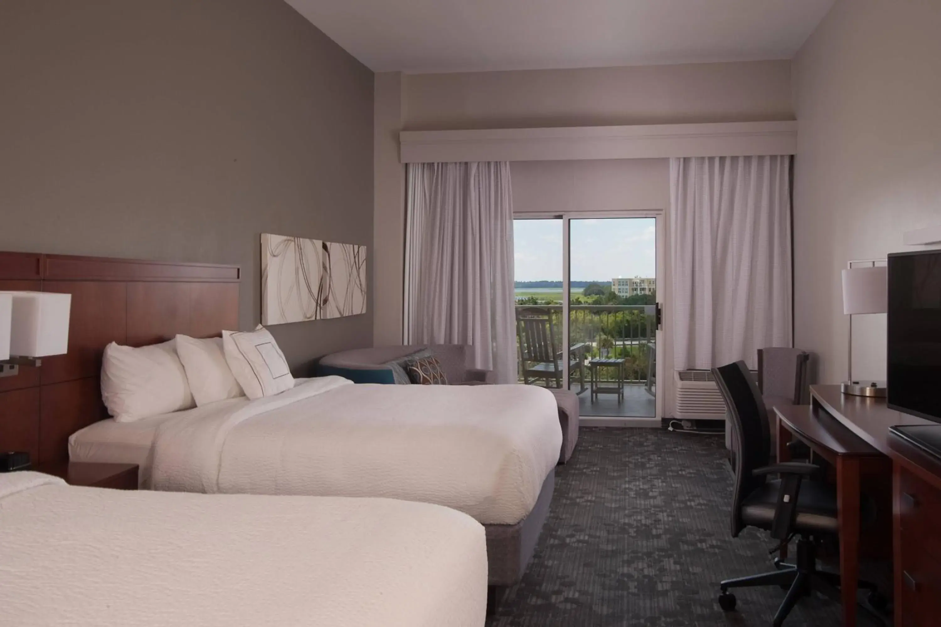 Larger Guest room, 2 Queen, Sofabed, Partial water view in Courtyard Charleston Waterfront Larger Guest room, 2 Queen, Sofabed, Partial water view in Courtyard Charleston Waterfront