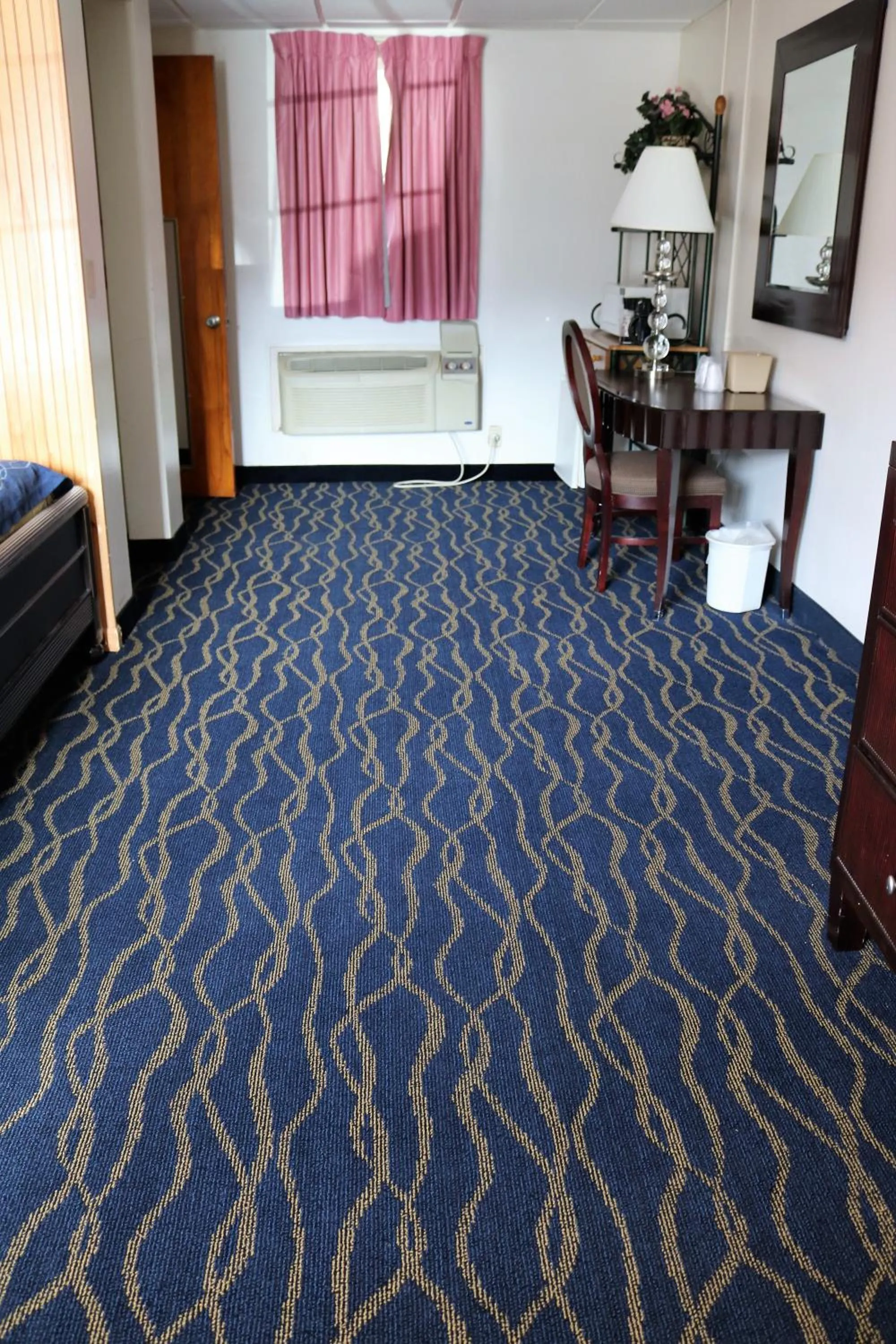 Bedroom in Rodeway Inn Harlan