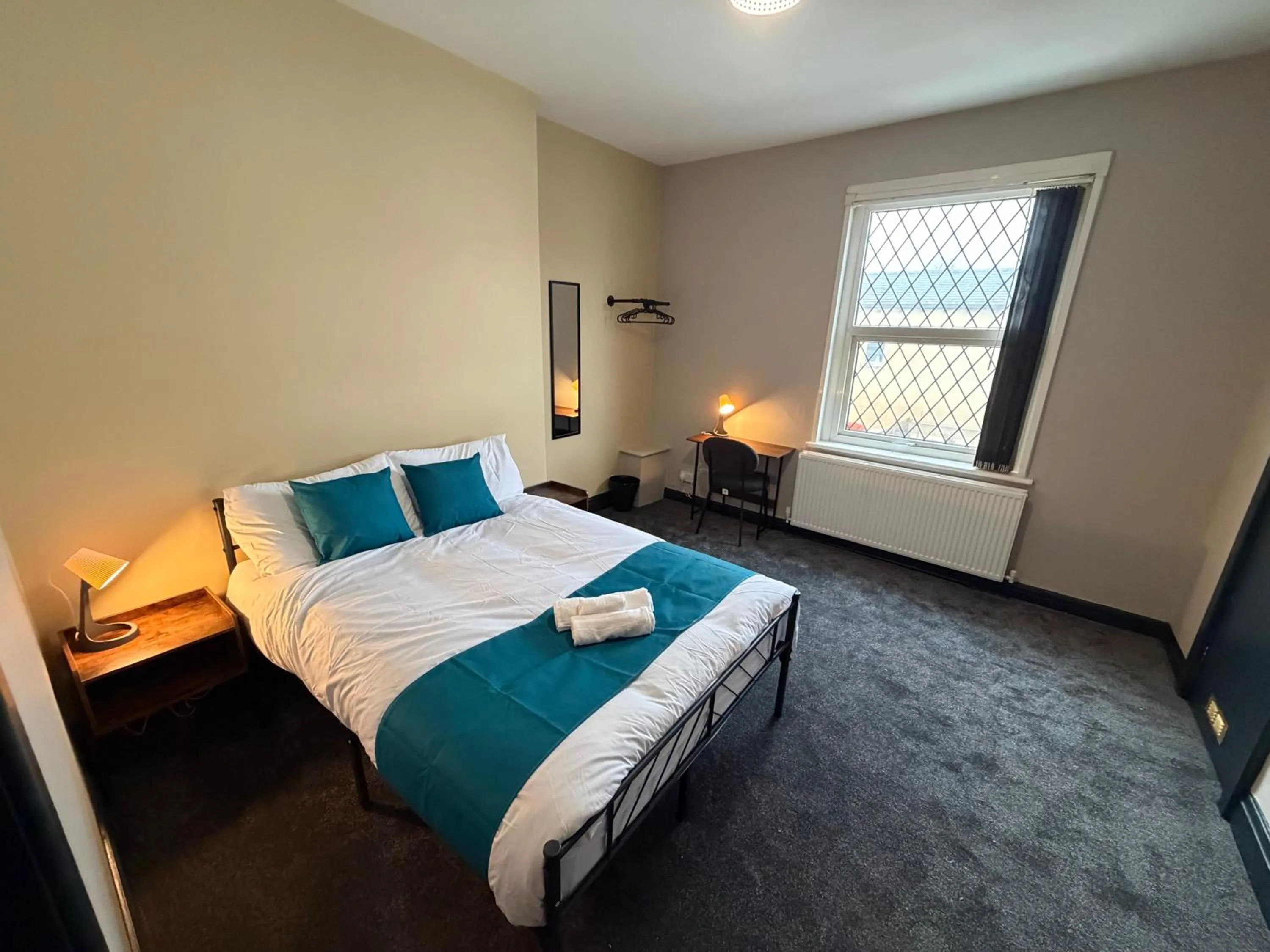 Bed in The Victoria Bar & Hotel