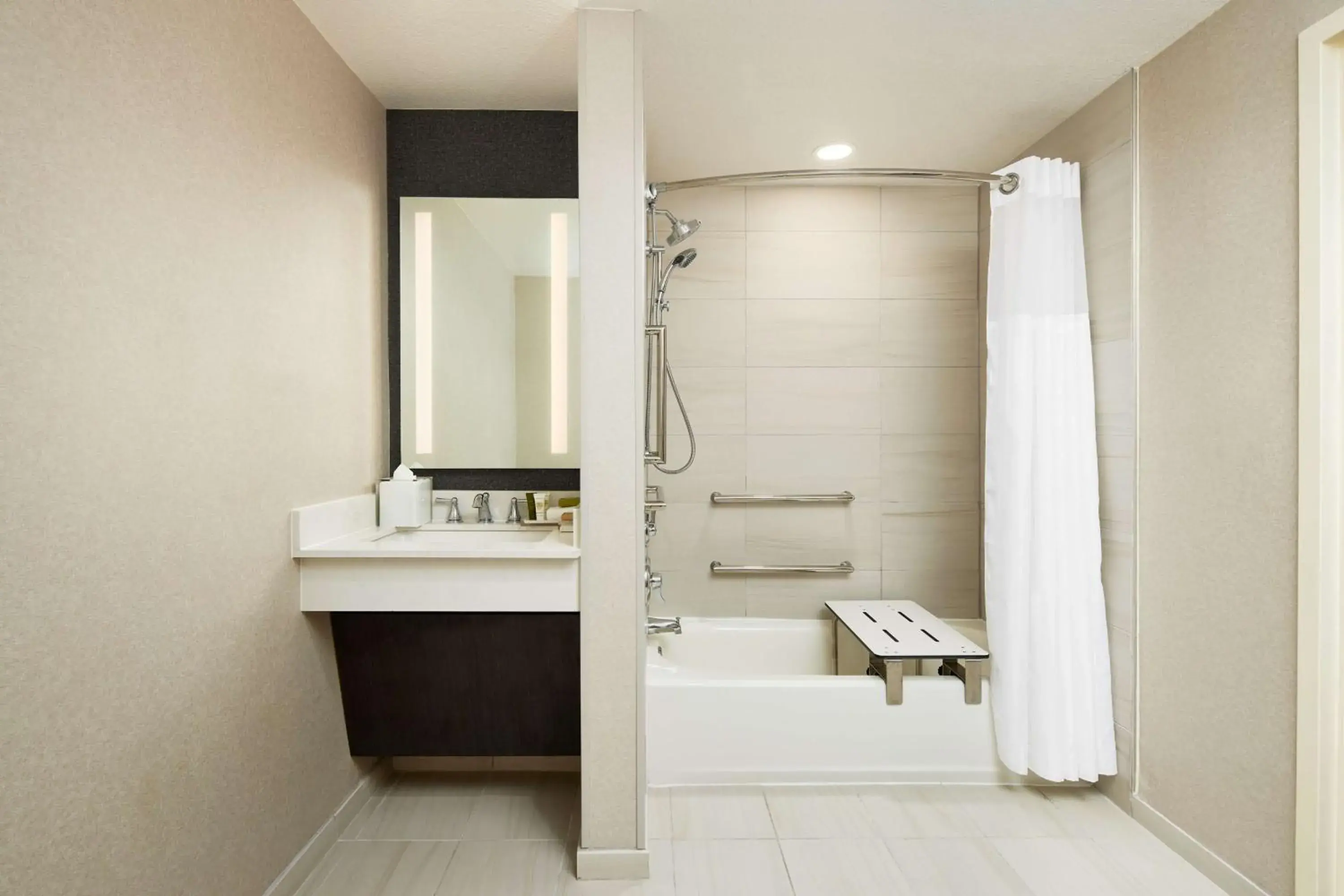 Queen Suite - Mobility Accessible with Tub in Hilton Charlotte Airport Hotel Queen Suite - Mobility Accessible with Tub in Hilton Charlotte Airport Hotel