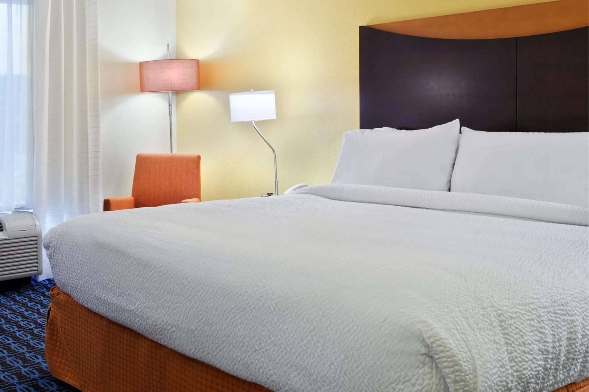 Bed in Fairfield Inn & Suites Charlotte Arrowood