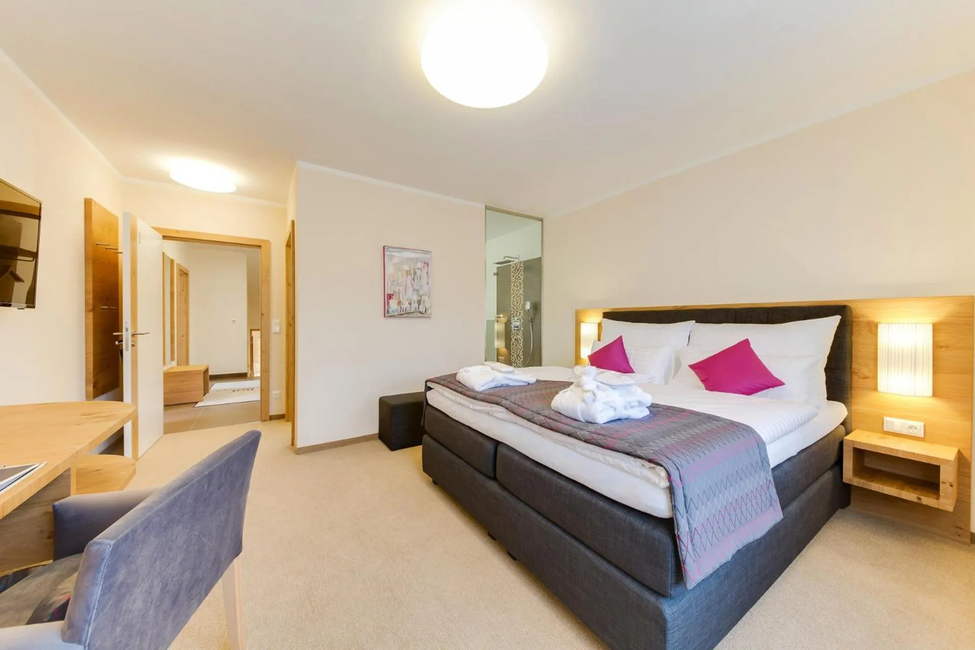 Bed in R&R Residenzen Aparthotel