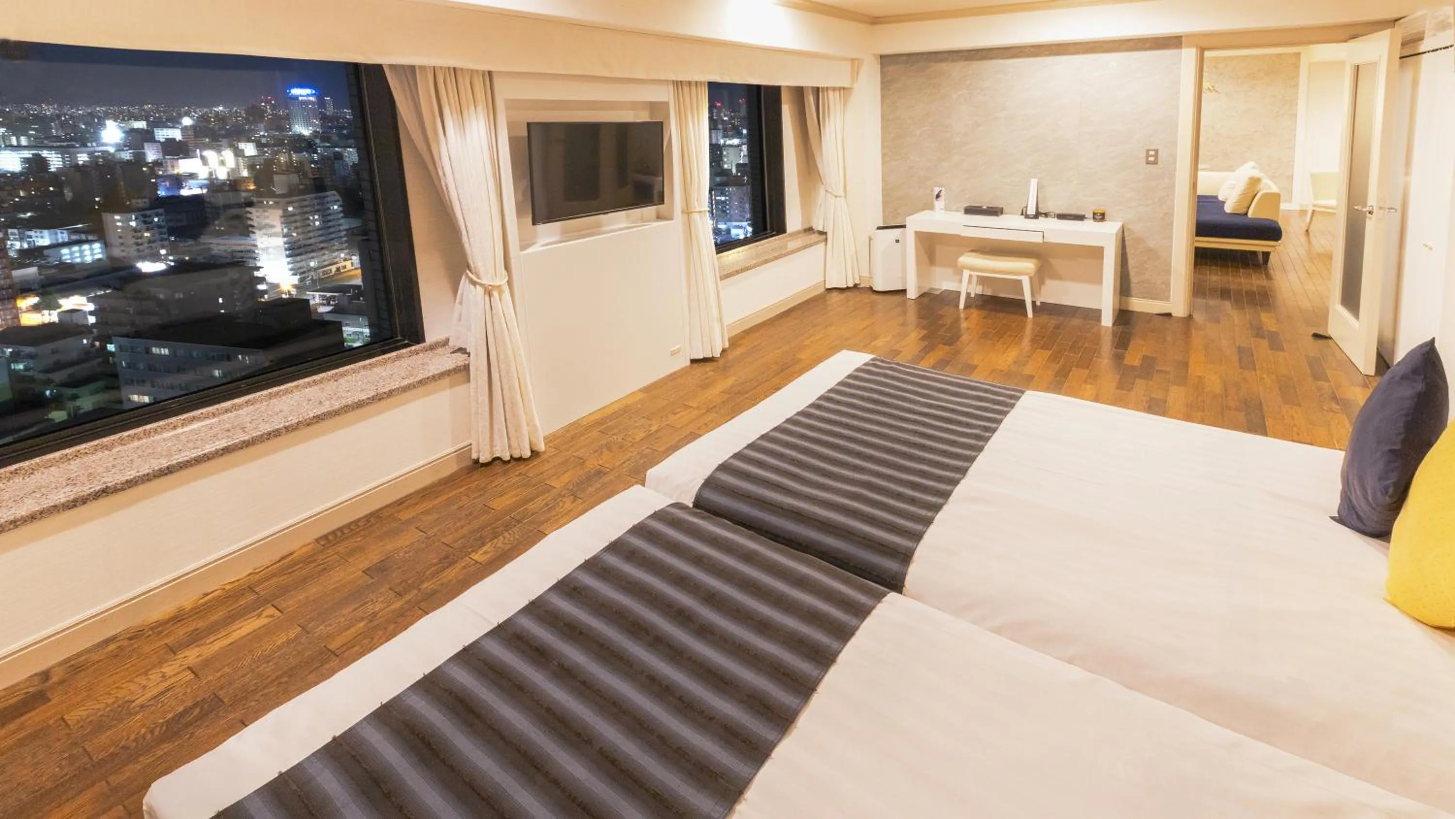 Bed in Premier Hotel Nakajima Park Sapporo