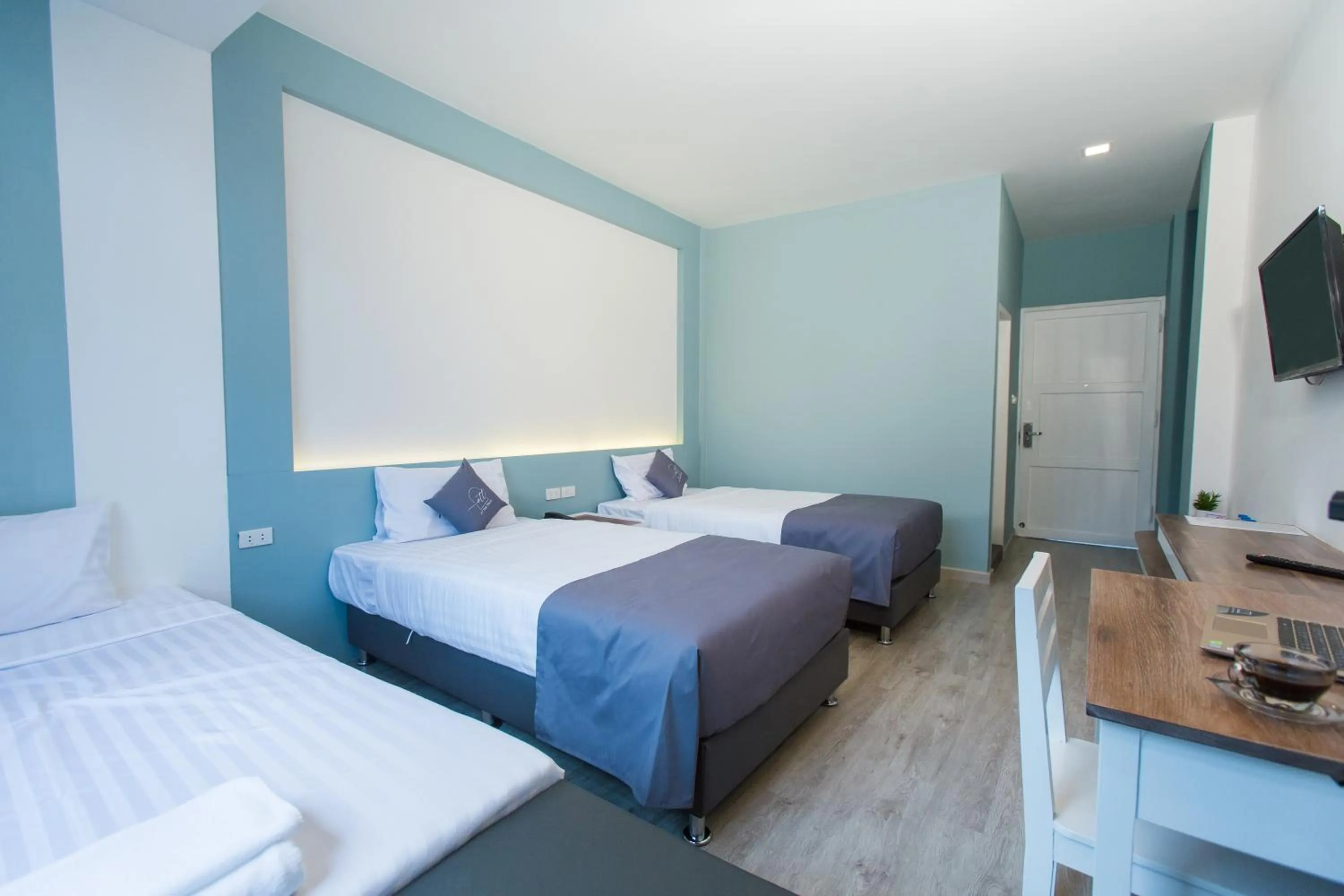 Bed in At the Train Chiang Mai Hotel