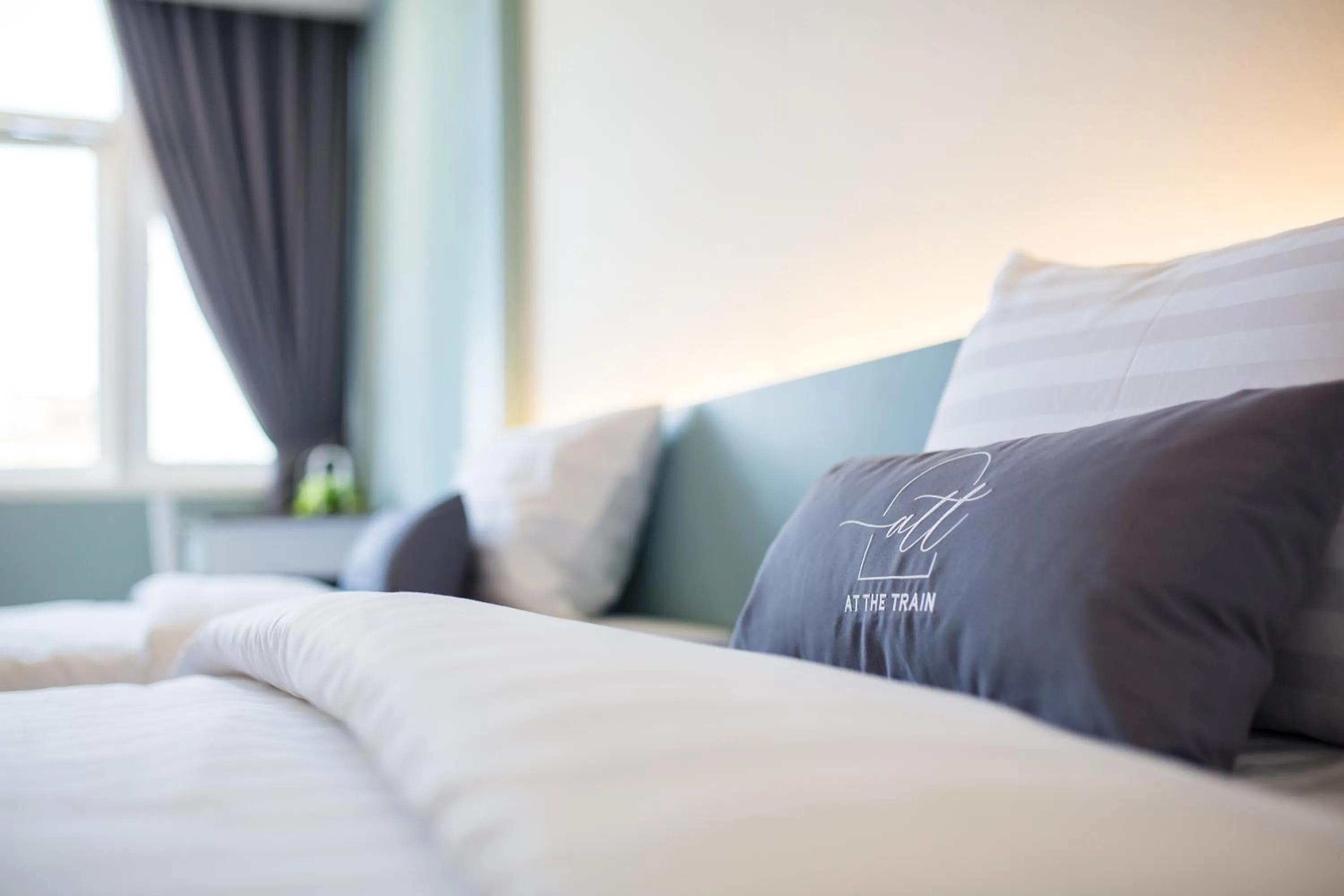 Bed in At the Train Chiang Mai Hotel