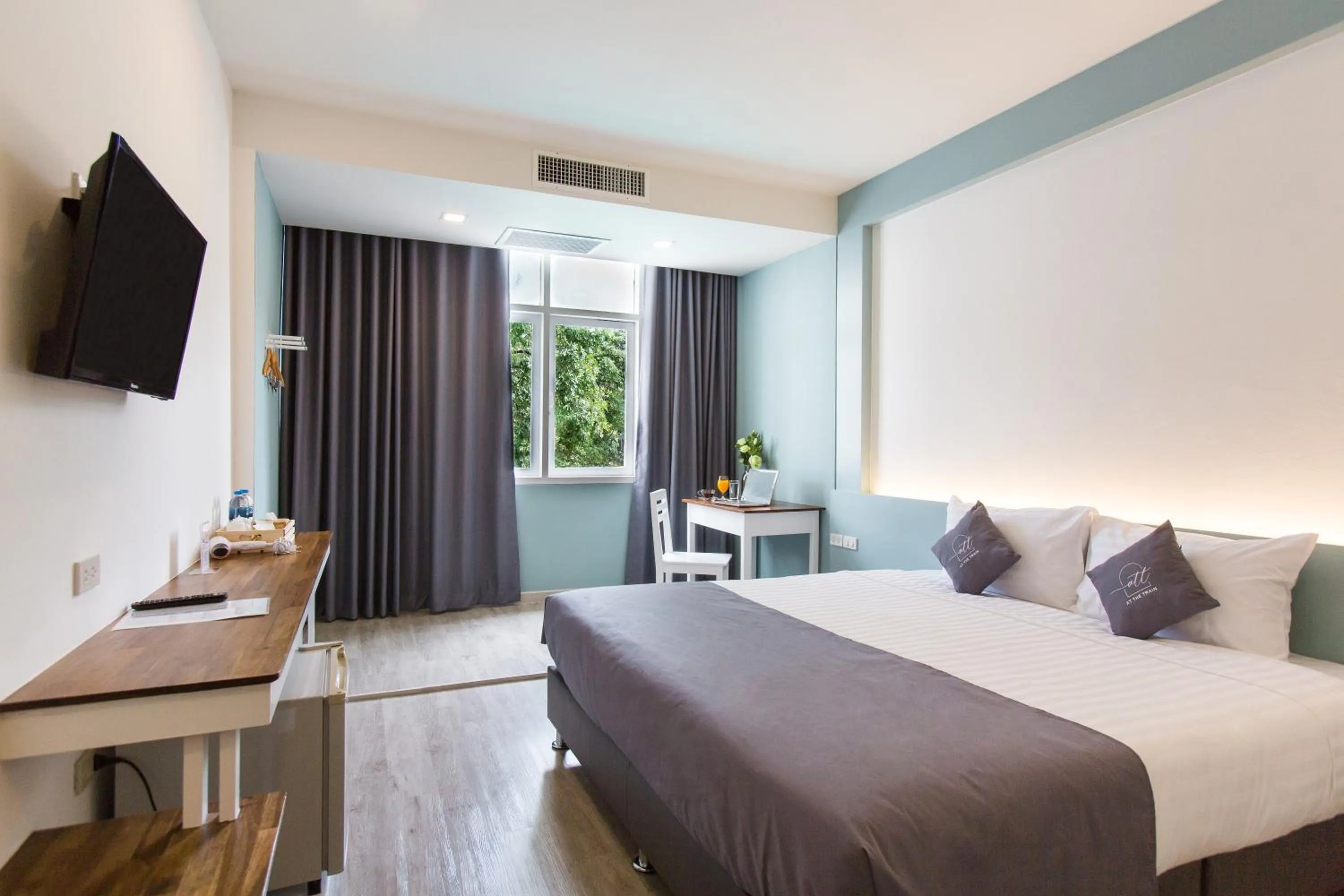 Bed in At the Train Chiang Mai Hotel