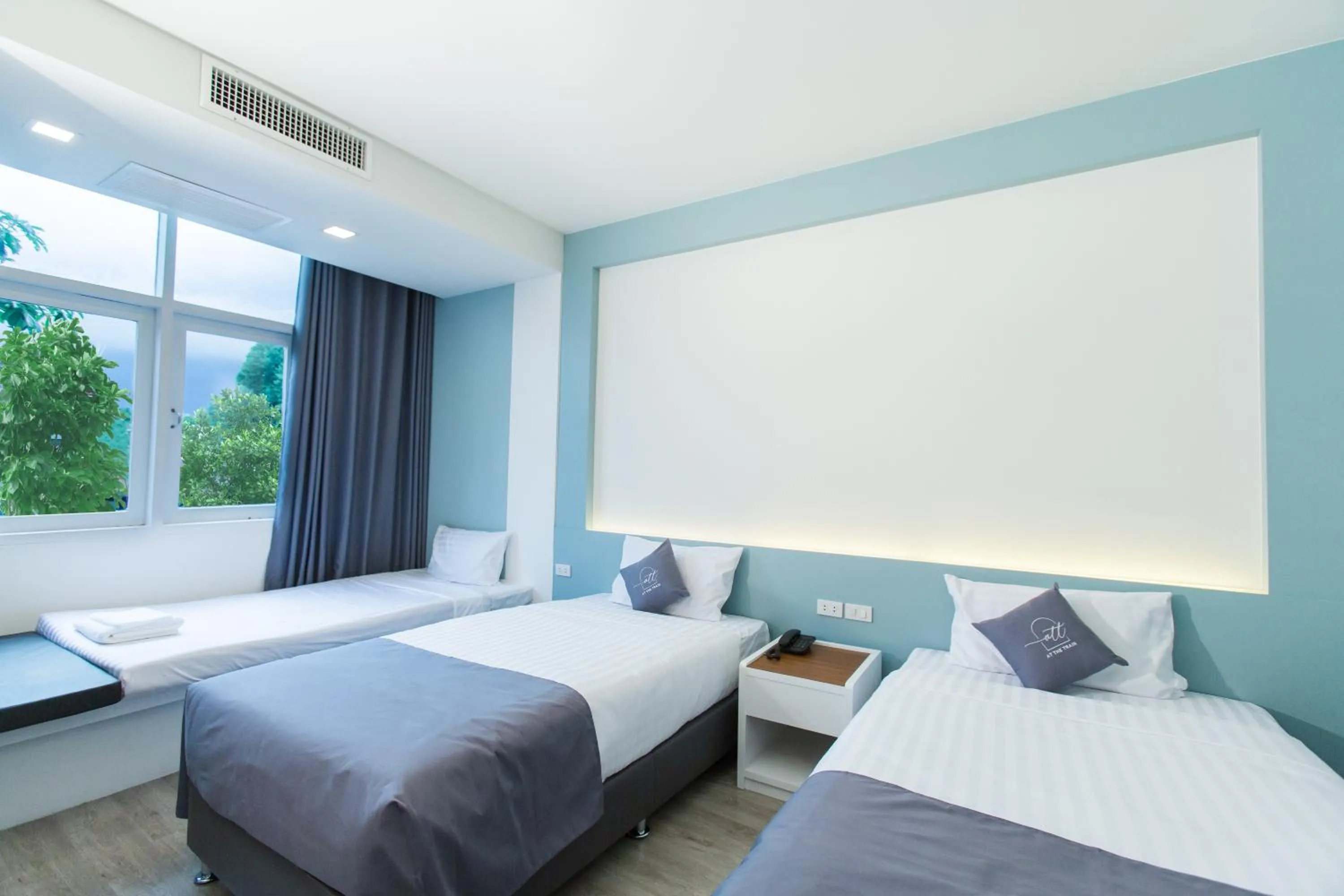 Bed in At the Train Chiang Mai Hotel