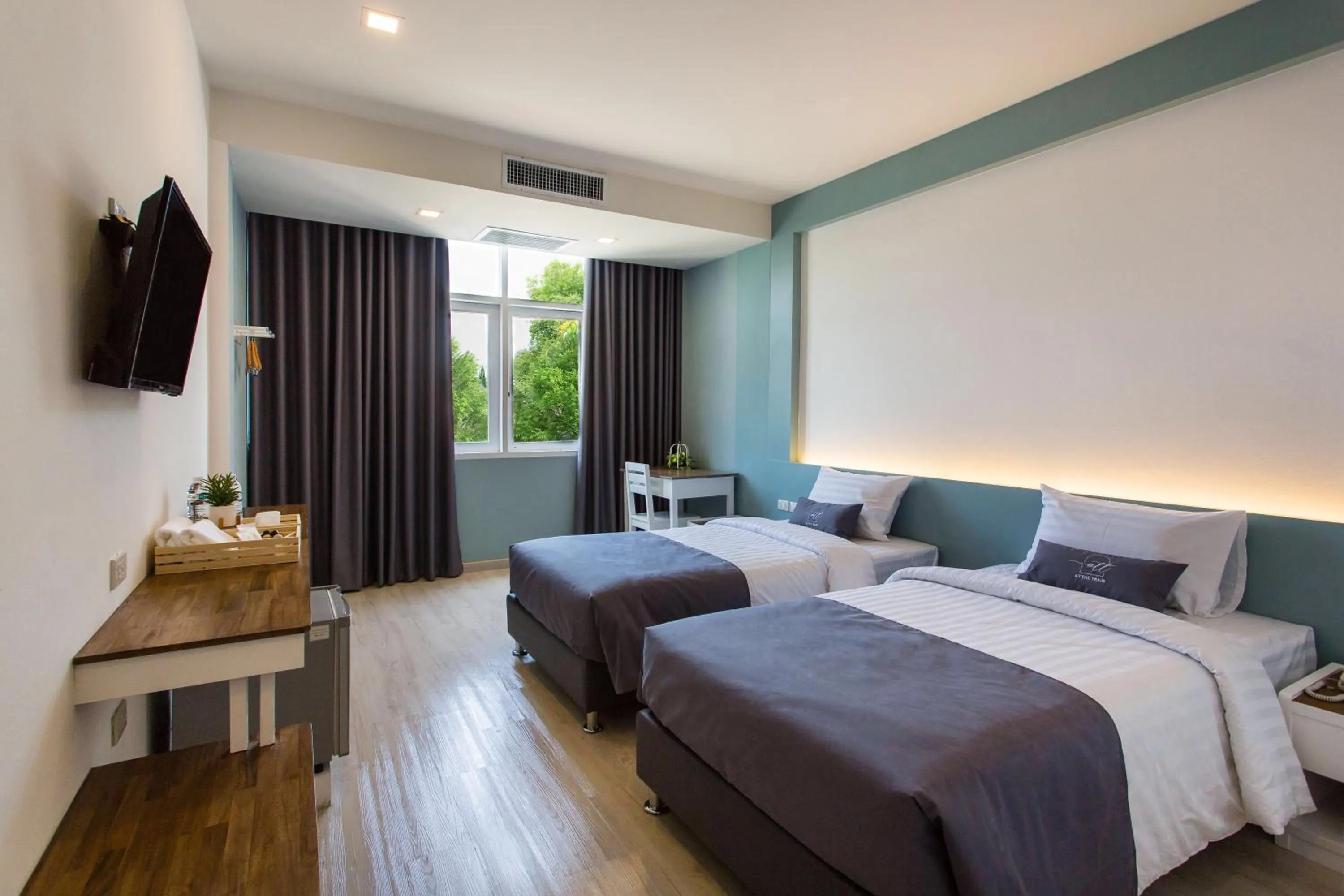 Bed in At the Train Chiang Mai Hotel