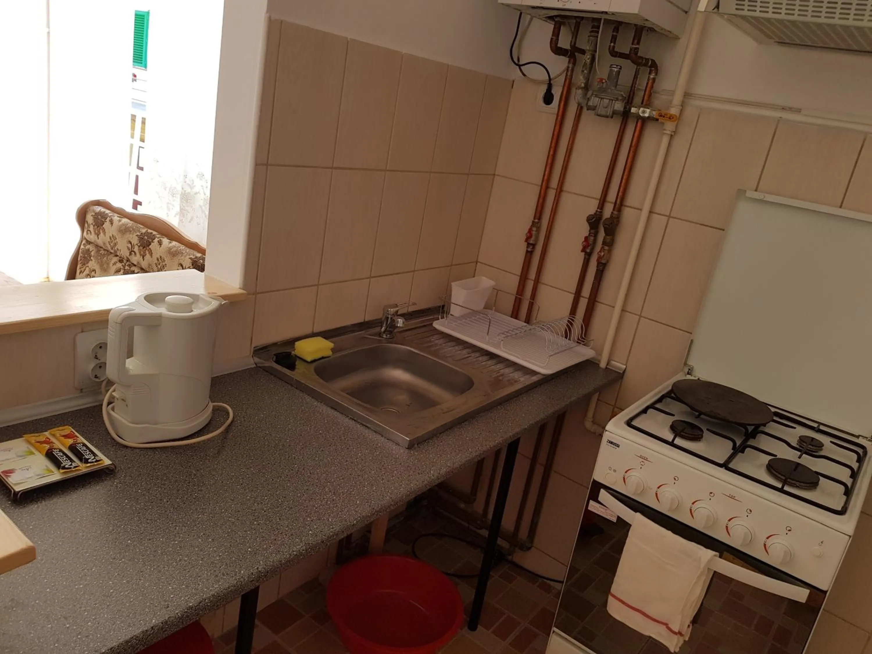Kitchen or kitchenette in Luk Old Town Apartment