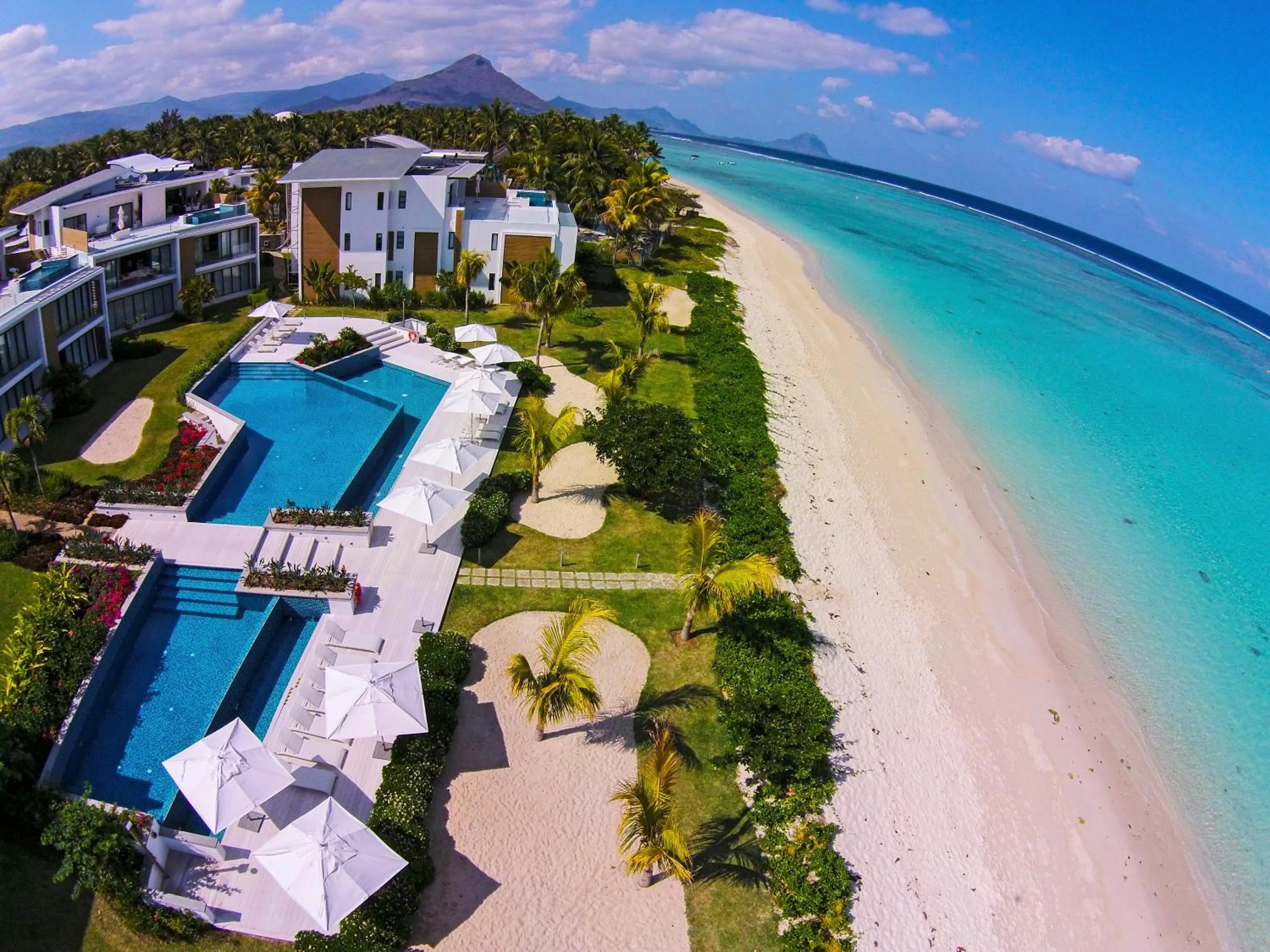 Swimming pool in Cap Ouest Beachfront Luxury Penthouse & Apartment