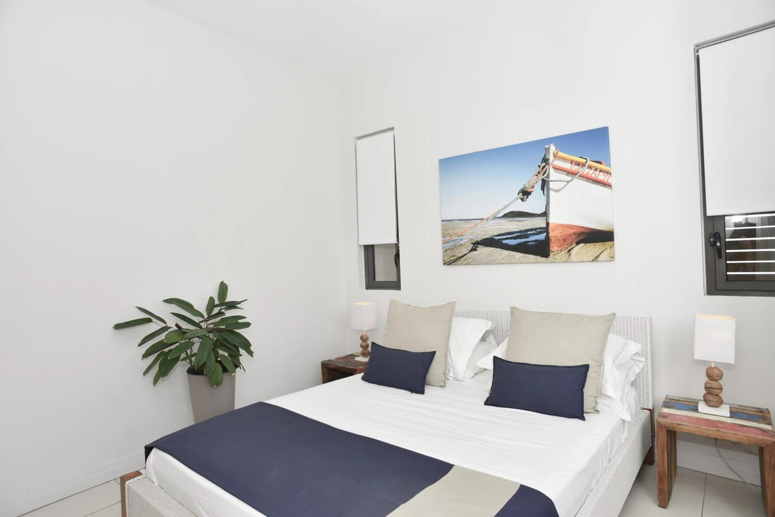 Bed in Cap Ouest Beachfront Luxury Penthouse & Apartment