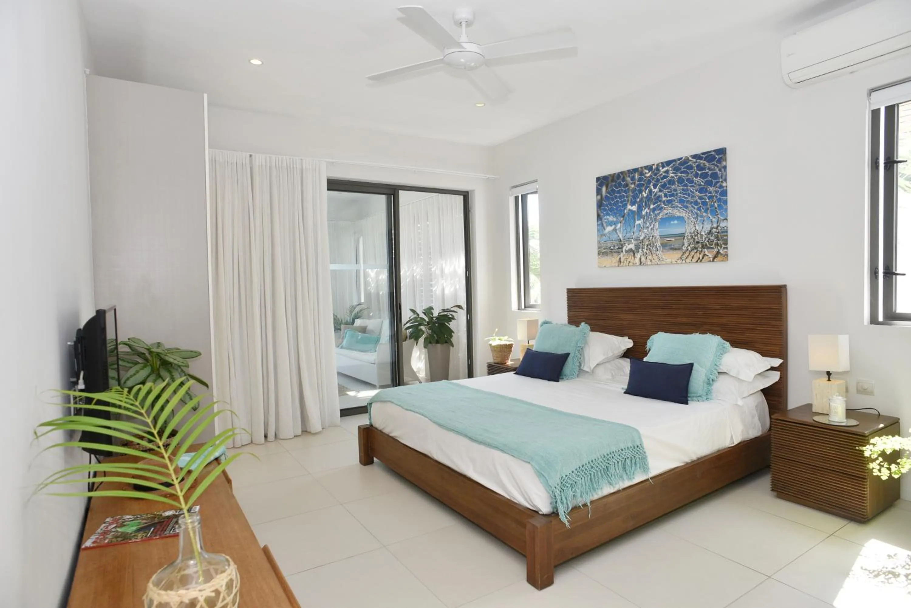 Bed in Cap Ouest Beachfront Luxury Penthouse & Apartment