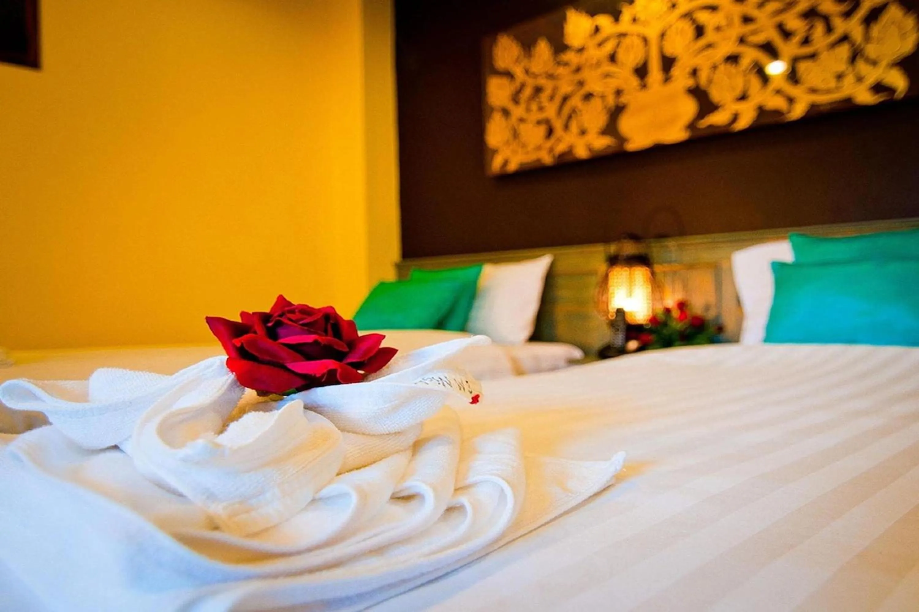 Bed in CM Night Bazaar Boutique Hotel - โรงแรม ซี เอ็ม ไนท์บาซาร์ บูทีค