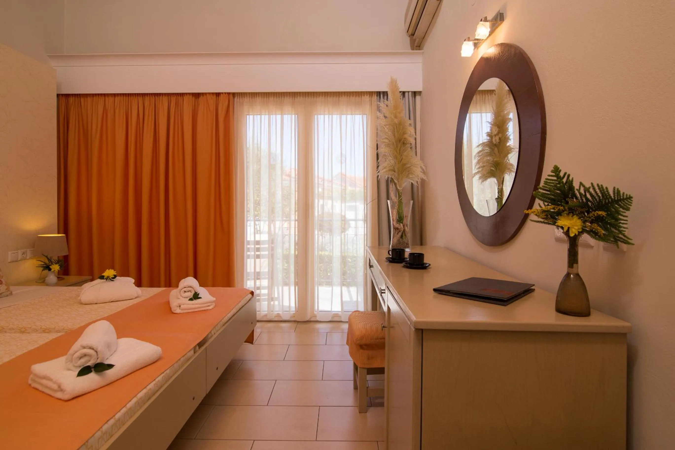 Bed in Sunrise Resort Hotel