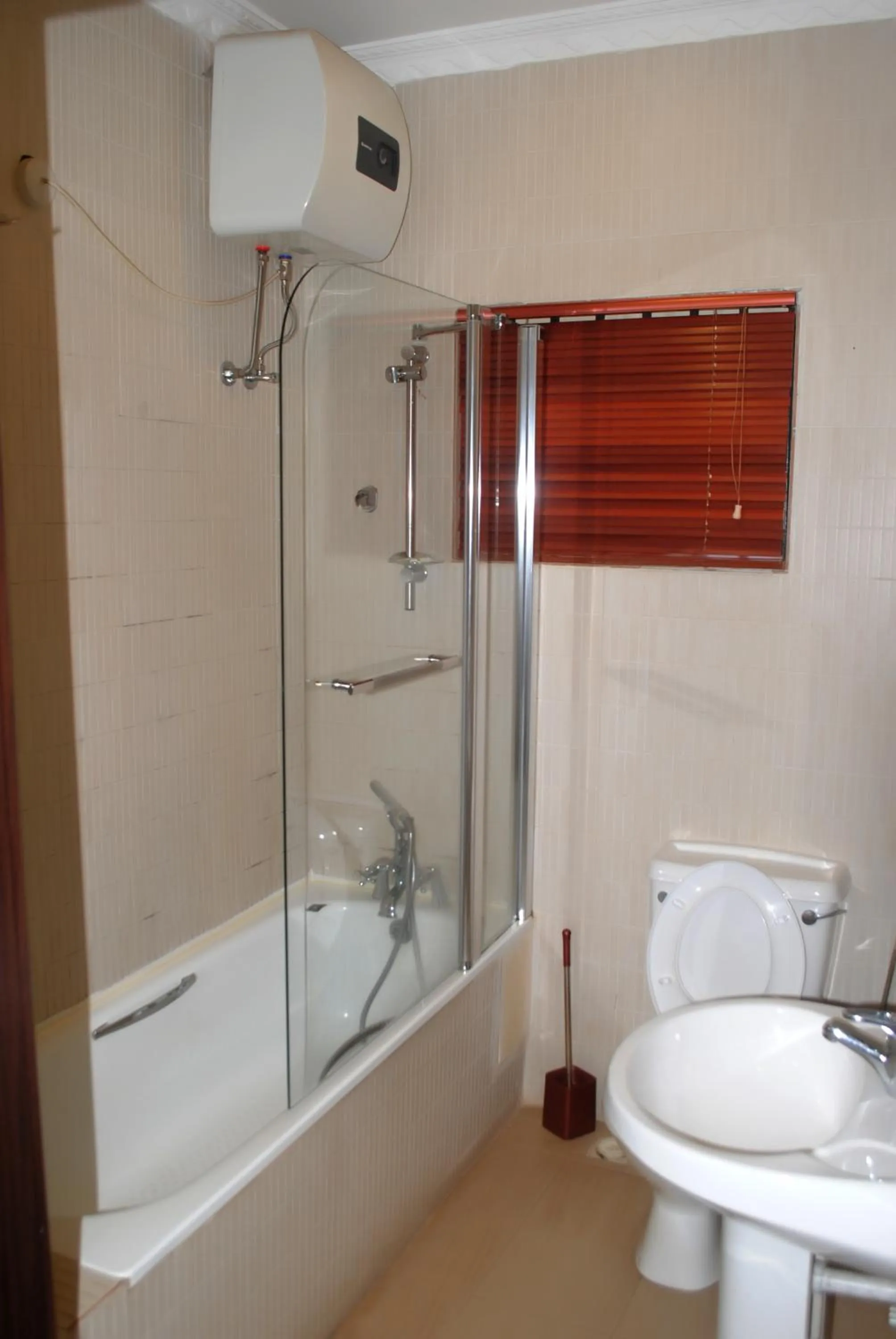 Bathroom in Grand Inn & Suites