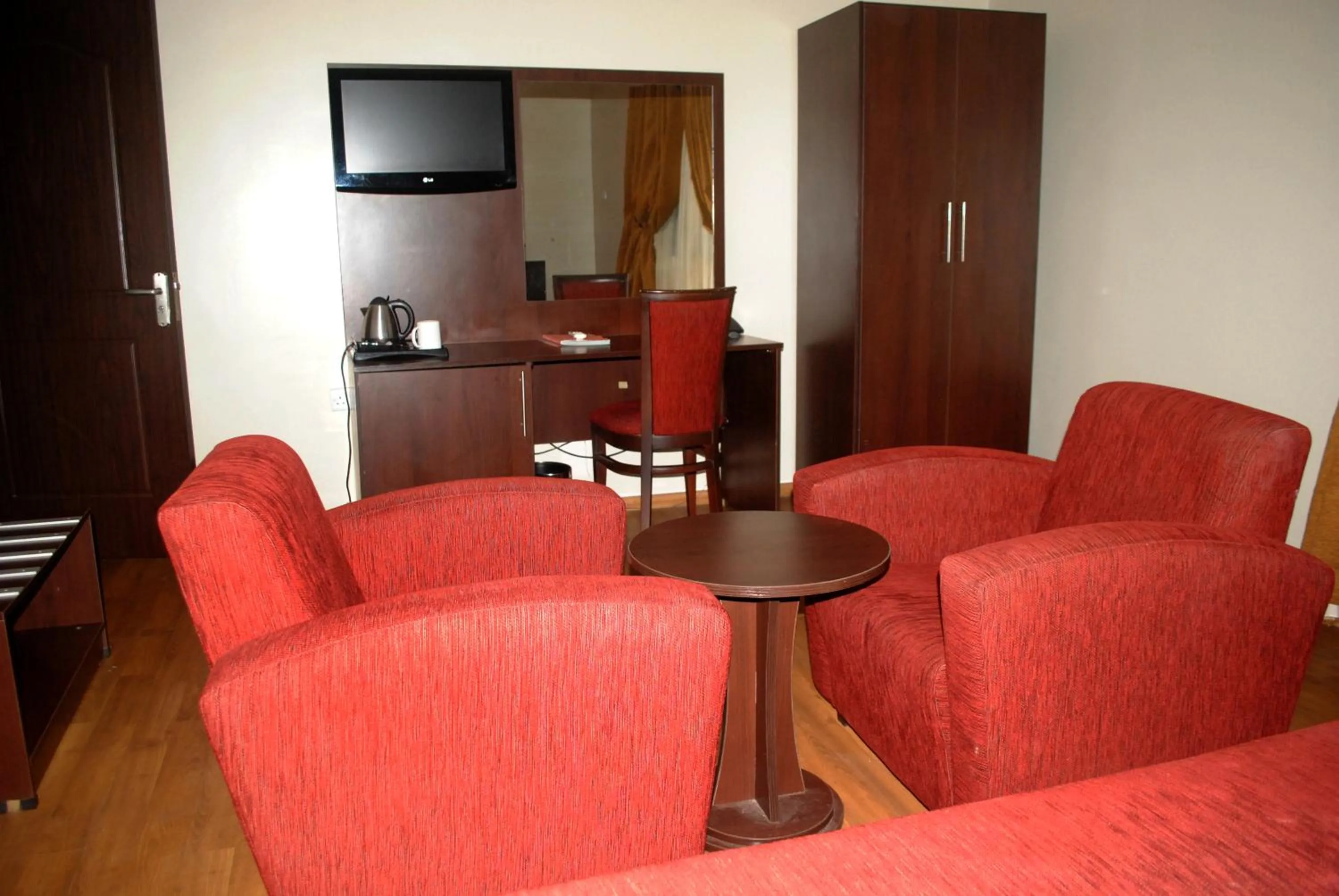 Seating area in Grand Inn & Suites