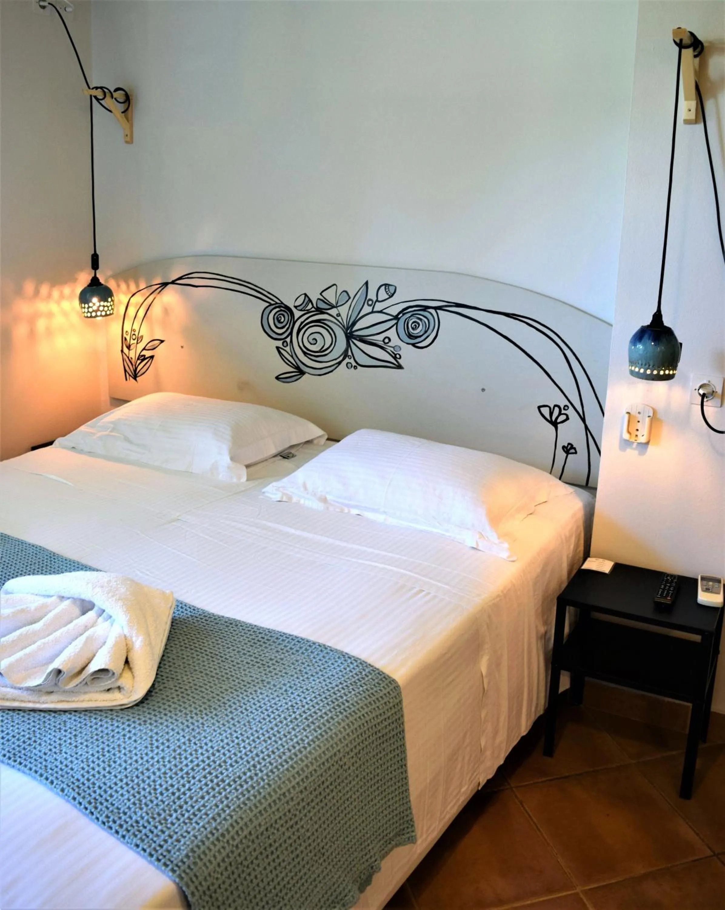 Bed in Simatos αpARTments & Studios