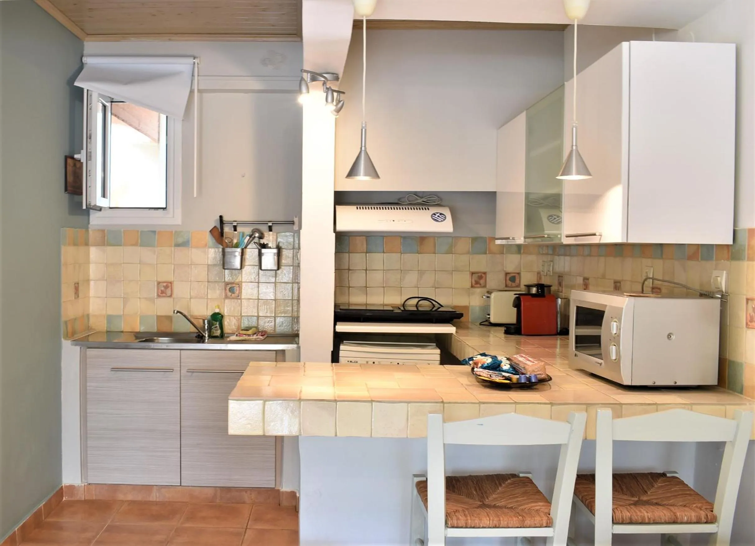 Kitchen or kitchenette in Simatos αpARTments & Studios