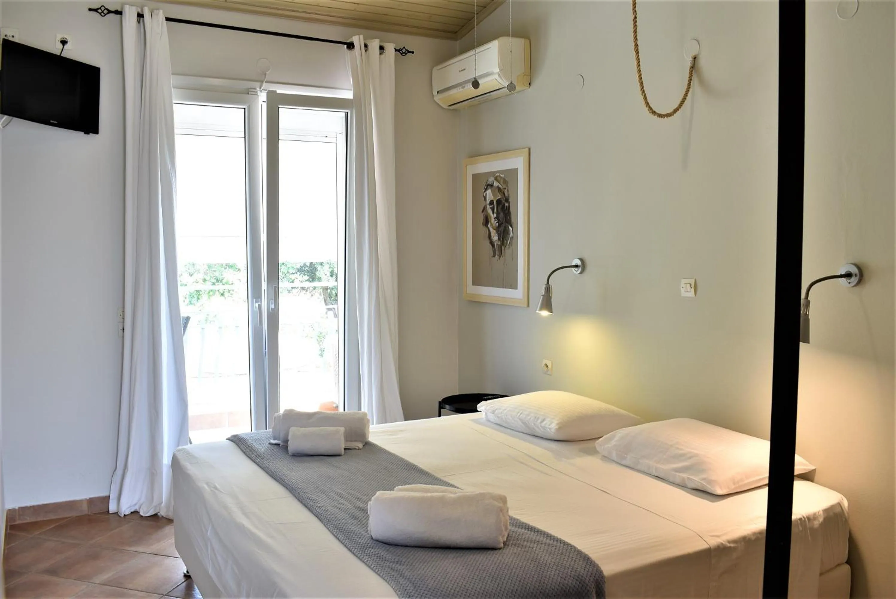 Bedroom in Simatos αpARTments & Studios