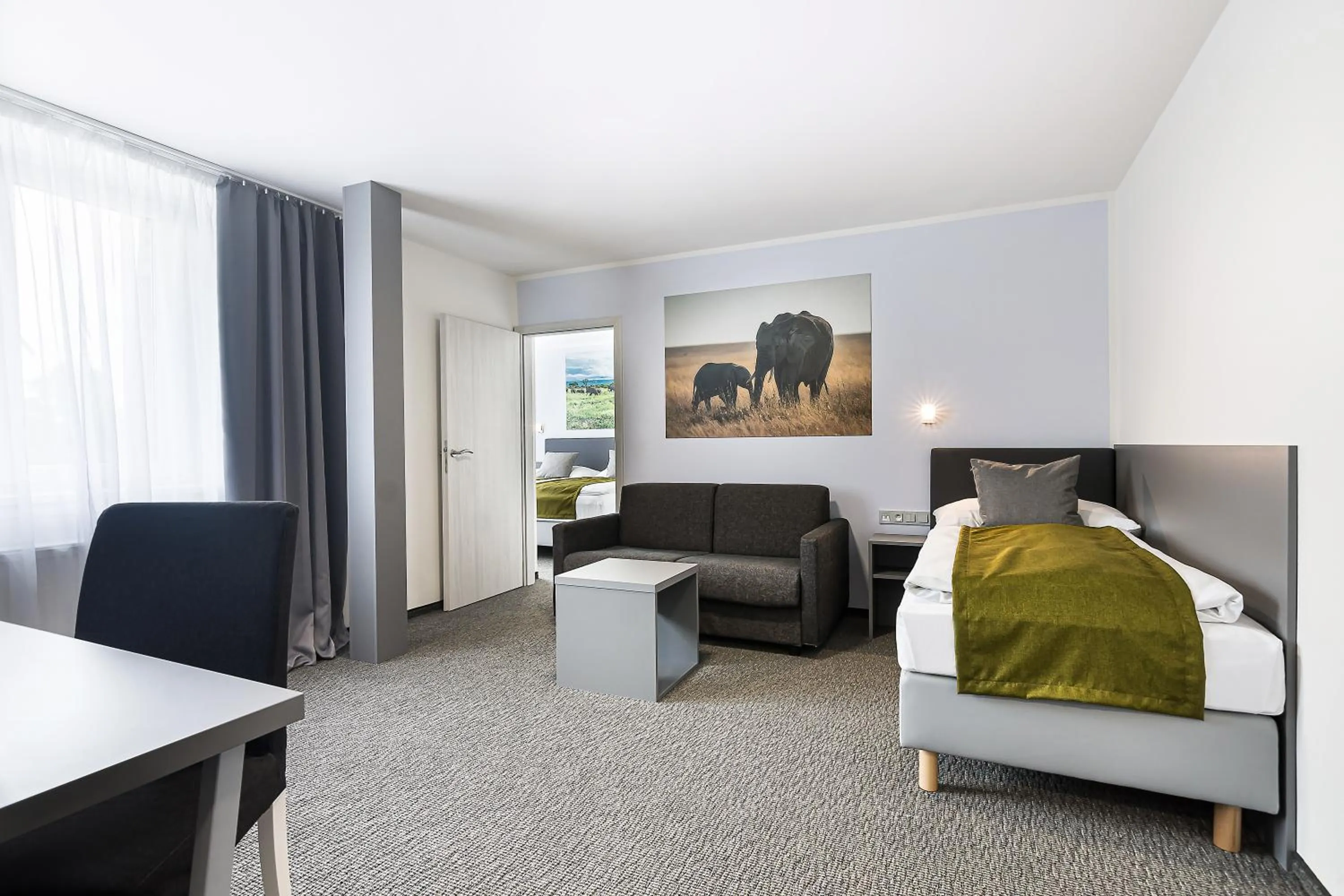 Living room, Bed in Hotel Atlantis