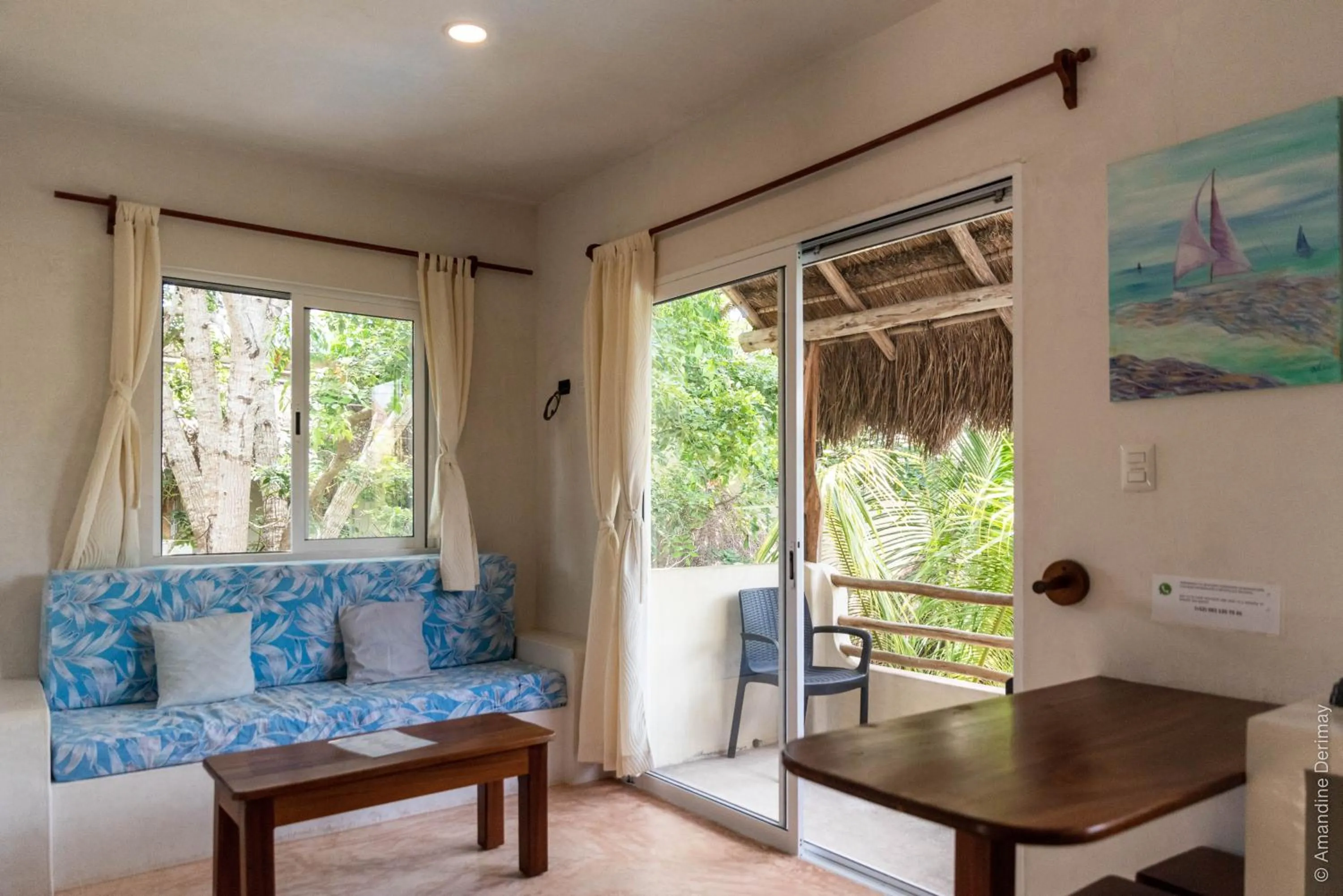 Living room in Hotel & Suites Oasis Bacalar