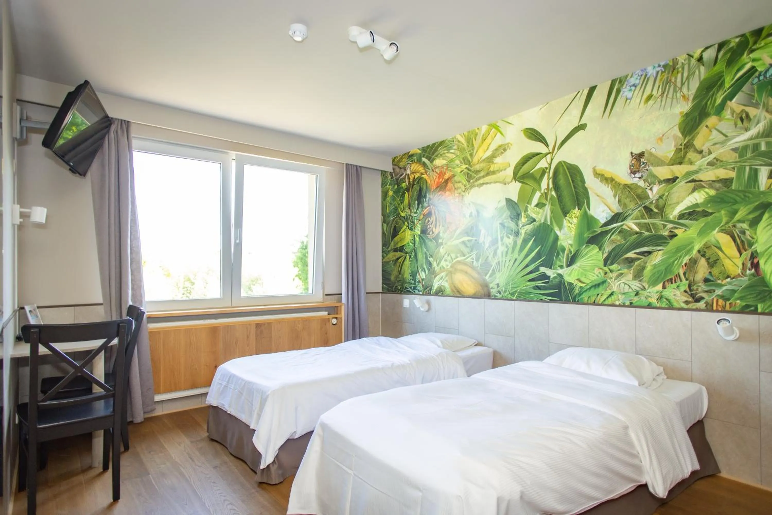 Bed in Thermae Grimbergen Hotel