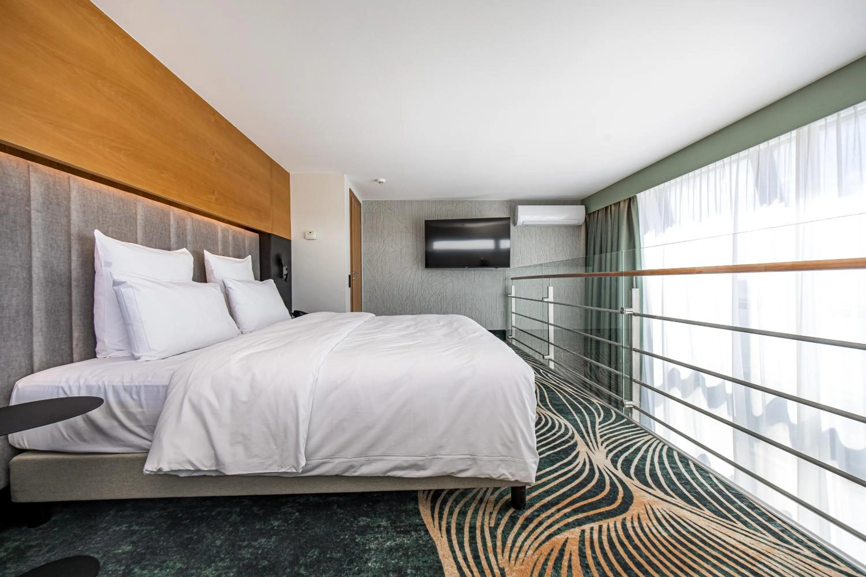 Seating area, Bed in Mercure Palanga Vanagupe Resort & SPA