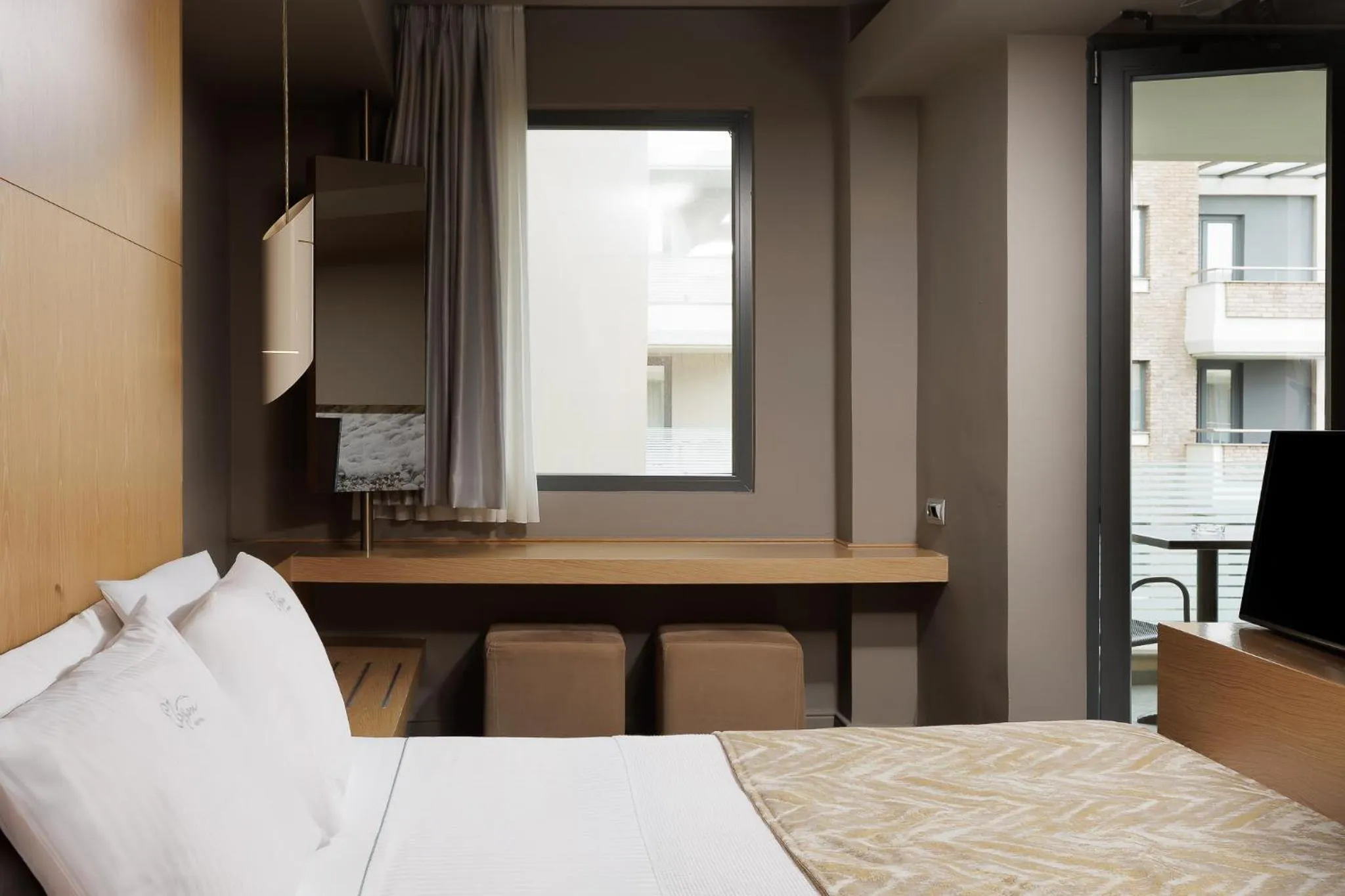 Bed in Elysion Hotel