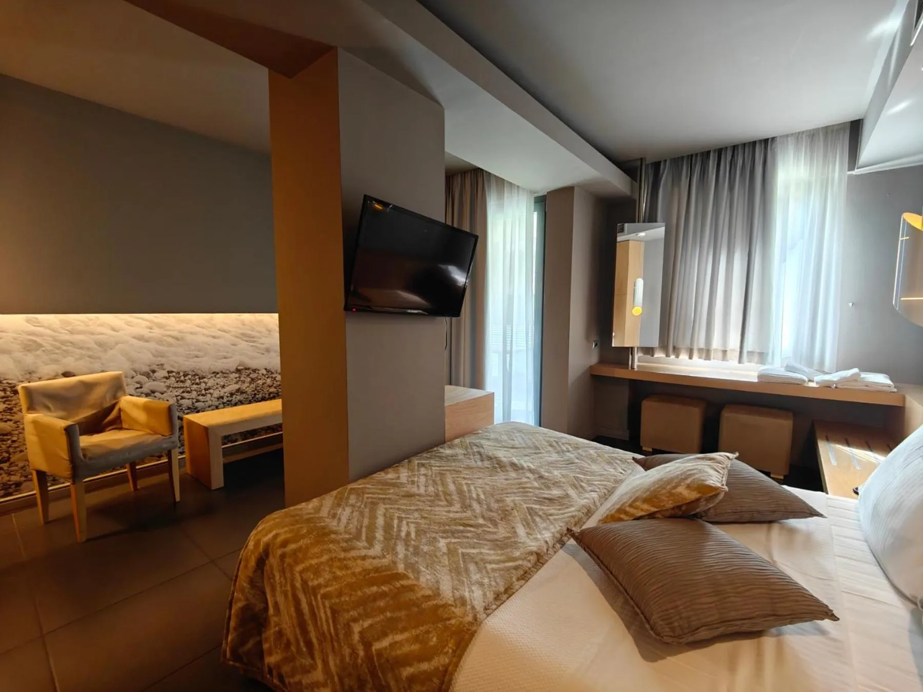 Bed in Elysion Hotel