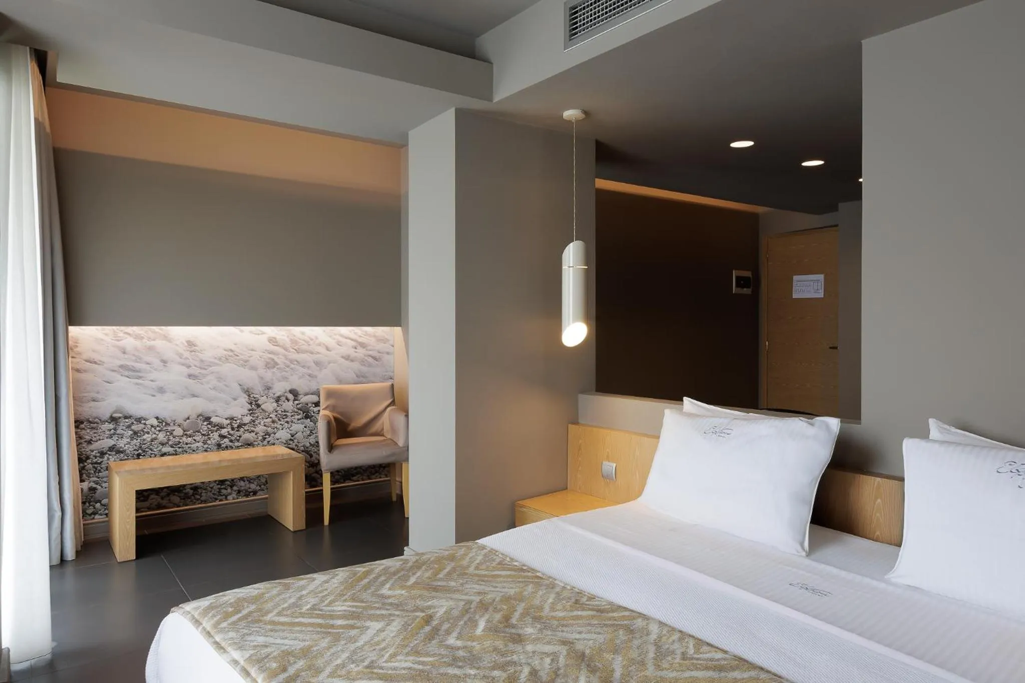 Bed in Elysion Hotel