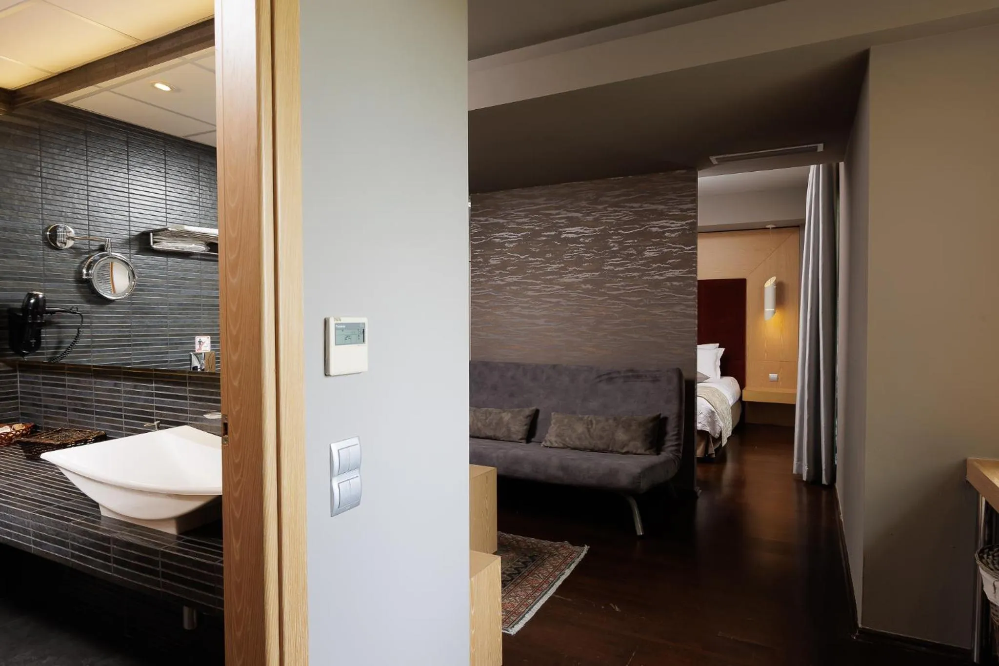 Bed in Elysion Hotel