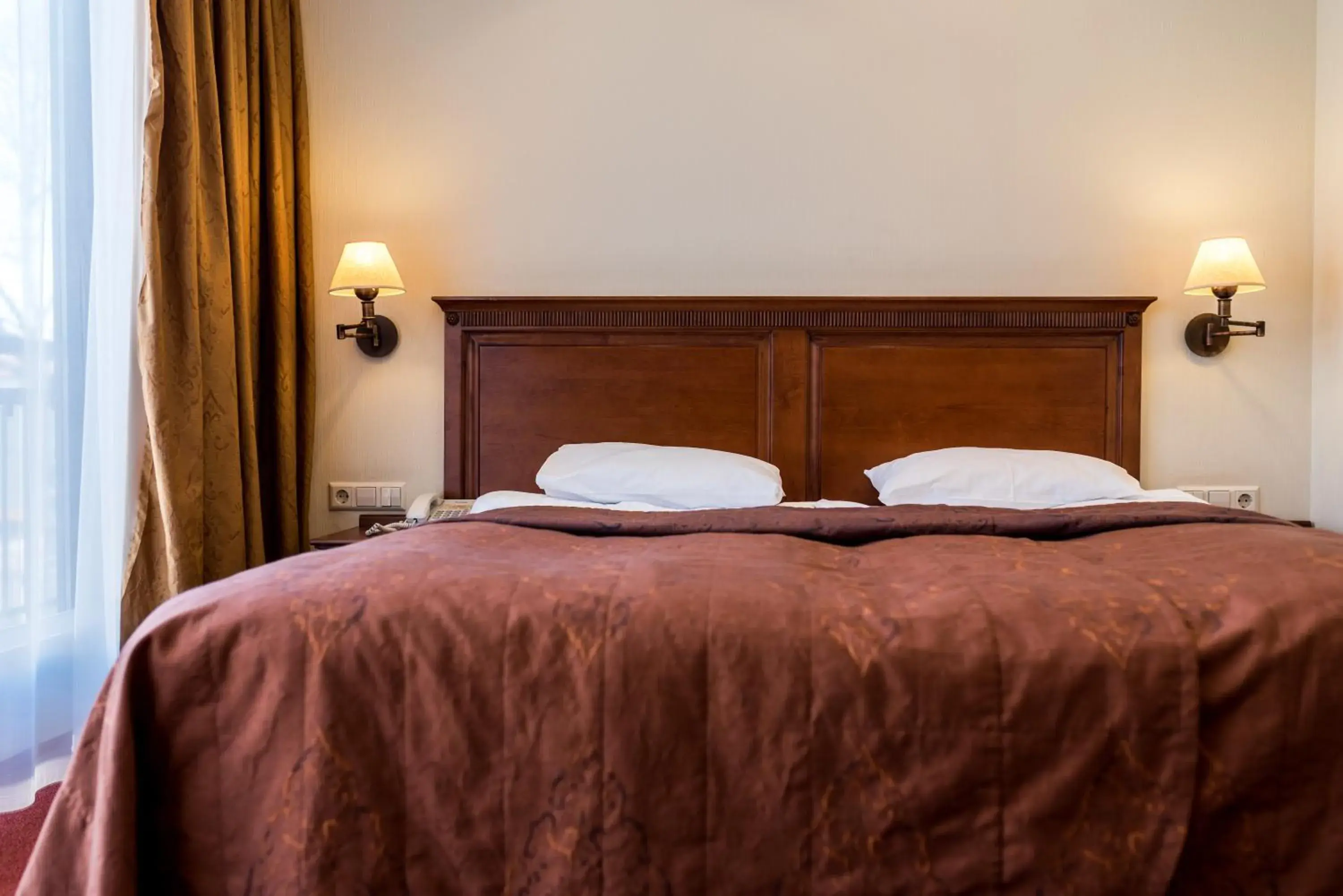 Bed in Daugirdas Old City Hotel Bed in Daugirdas Old City Hotel