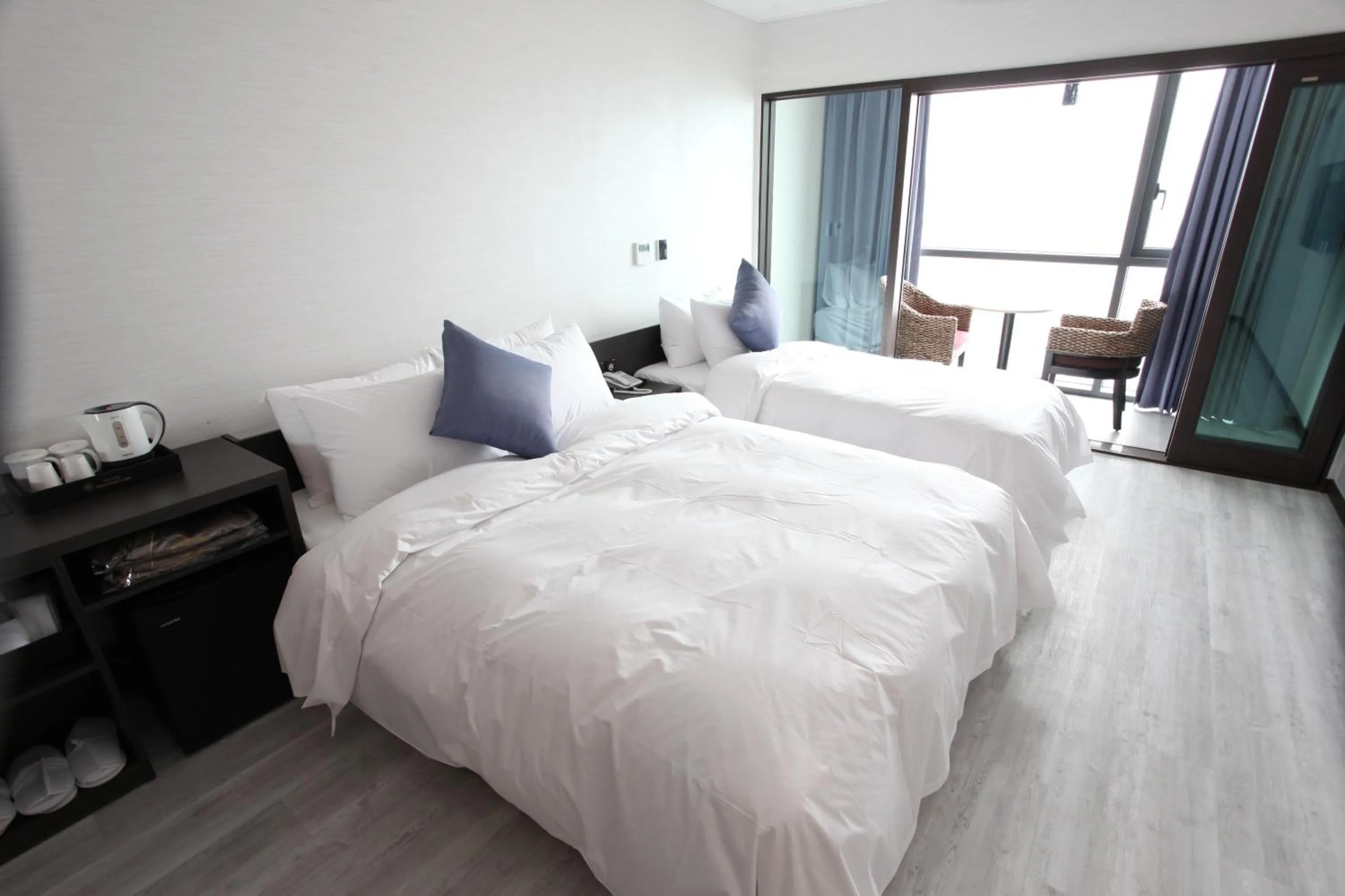 Bed in Hotel Wooyeon Flora