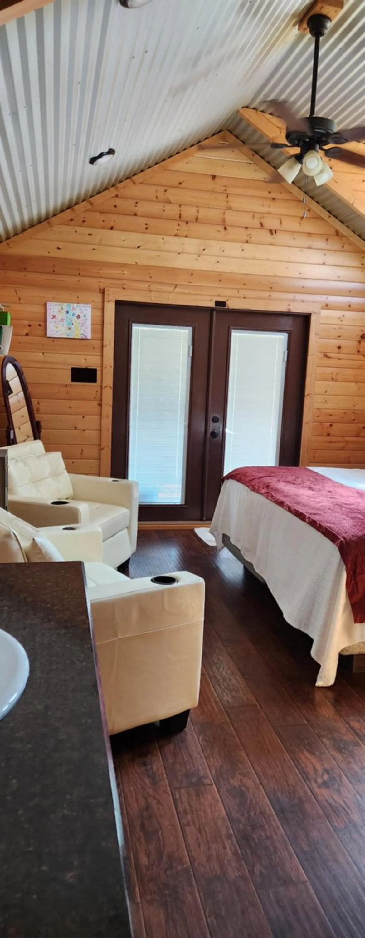 Seating area, Bed in Al's Hideaway Cabin and RV Space, LLC