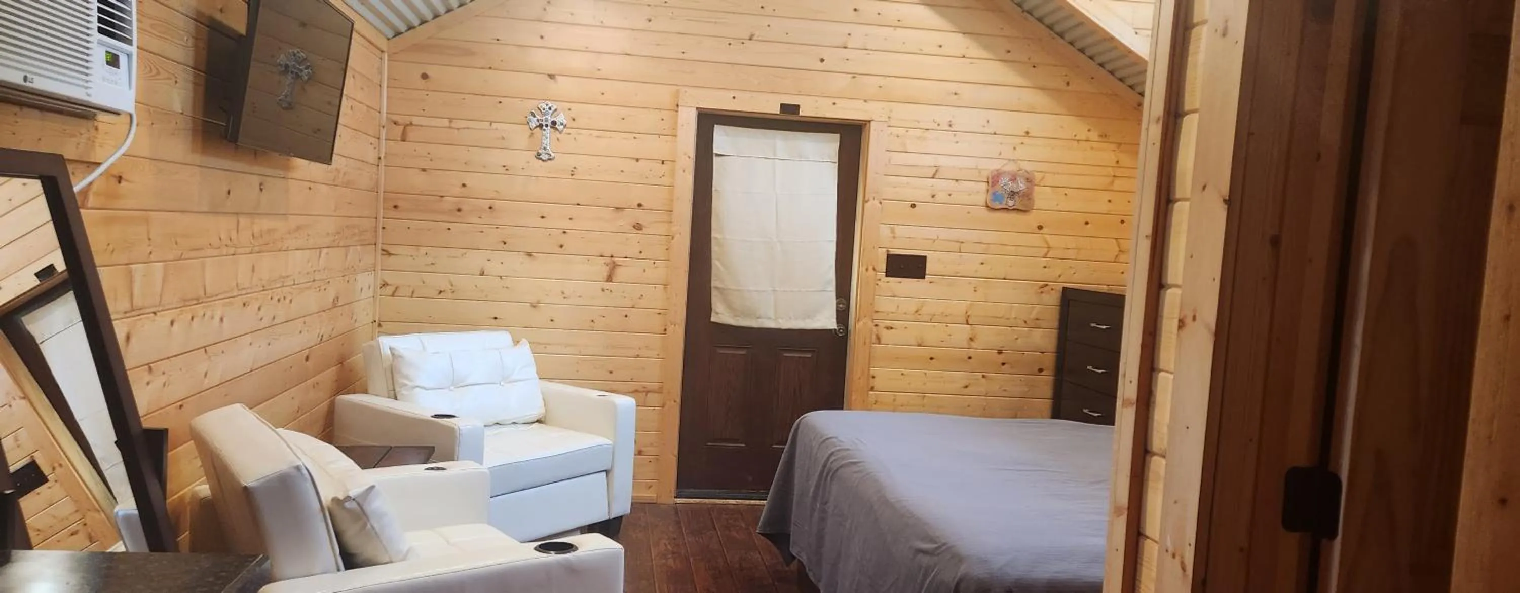 TV and multimedia, Bed in Al's Hideaway Cabin and RV Space, LLC