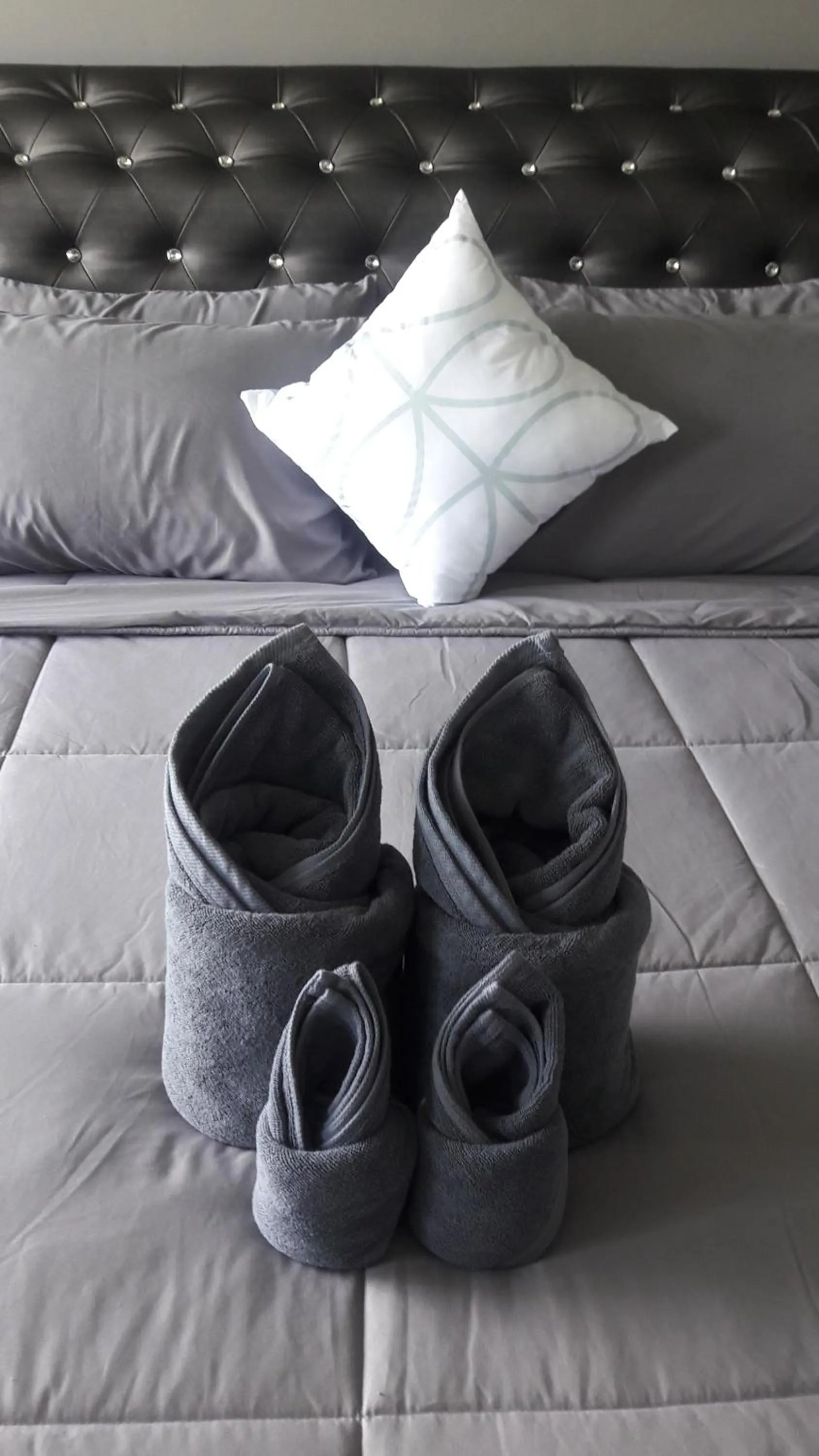 Bed in Asia's Beach Apartments